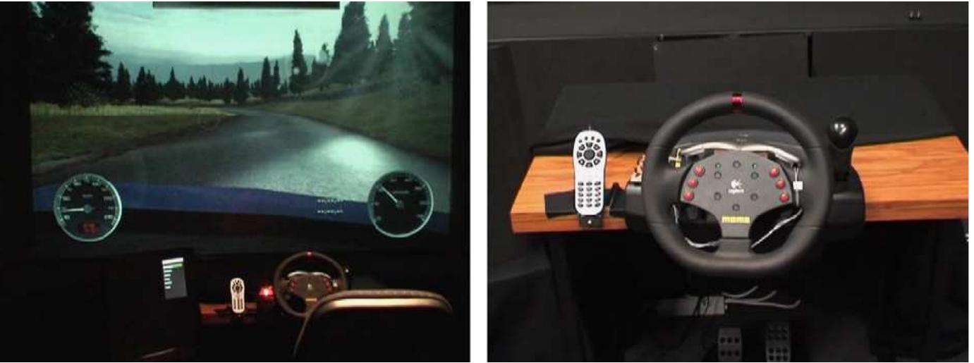 Fig. 3. Car simulator with a large projection screen, steering wheel, and interaction device. 