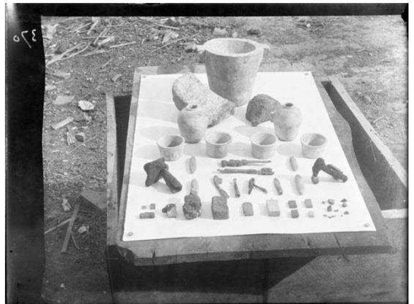 Figure 3. Foundation deposit from the pylon of the sanctuary of Amun- Ra, built under Ptolemy II Philadelphos (285-246 BC), excavated and photographed by Flinders Petrie in 1885. Photograph © Petrie Museum of Egyptian Archaeology, University College London, PMAN 2680. 