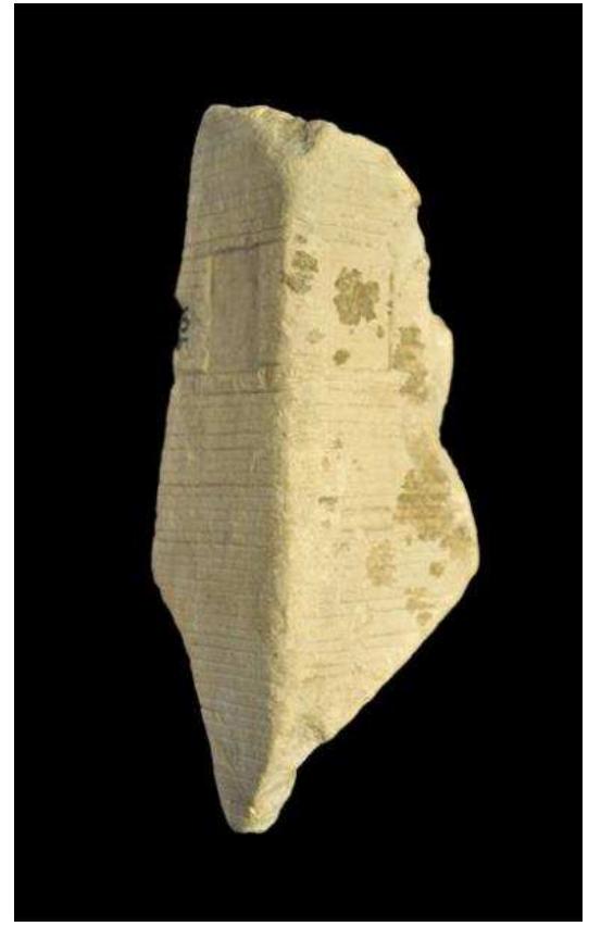 Figure 4. Limestone model of Egyptian tower house from Naukratis, showing two windows and courses of brick, 7th—5th century BC. British Museum, EA68816. 