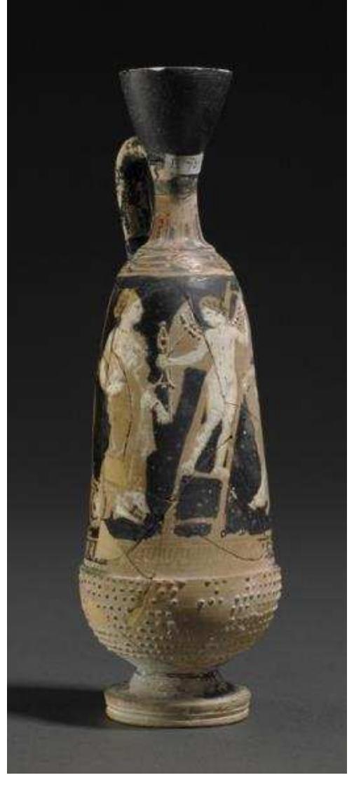 Figure 12. Attic red-figure acorn lekythos from the cemetery of Naukratis, c. 400-380 BC. British Museum, 1888,0601.716.  Nearly as elusive is Rhodian and other East Dorian painted pottery, whic is represented primarily by Vroulian cups and a few painted plates (for which Kos now seems to emerge as a prominent centre of production; Villing and Mommsen forthcoming). However, the picture may again be somewhat skewed, as lonian cups of East Dorian production were presumably originally more frequent than can be gleaned from the extant record. Several figure or ‘plastic’ vases, mostly East Greek perfume containers, have also been found (see also Moller 2000a, 146-7). A few vessels reached Naukratis from further afield, including Italy. A handful of fragments of Etruscan kantharoi (Fig. 11) and oinochoai are not altogethe surprising, given that a thin smattering of Etruscan bucchero is attested across the East Greek world (Naso 2006). 