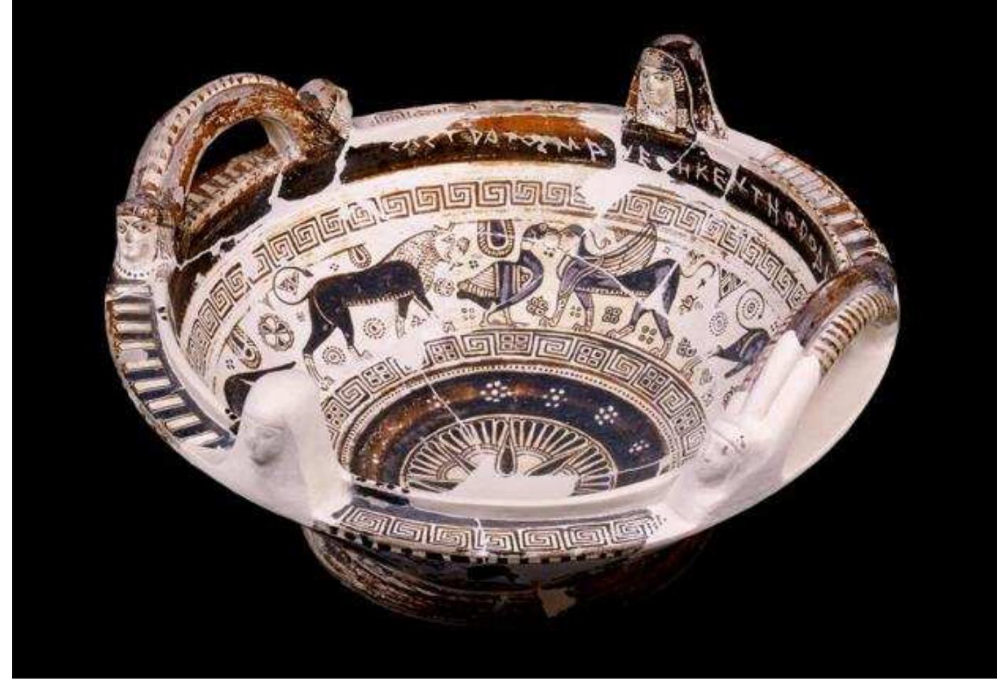 Figure 34. Chian bowl from the Aphrodite sanctuary, decorated with an animal frieze and carrying a votive inscription (graffito) to Aphrodite by Sostratos: ‘Zwotpatog ye ave8nkev THPpOdiTN|[’, late 7th century BC. British Museum, 1888,0601.456.  By far the largest number of inscriptions is the corpus of Greek inscriptions on pottery (Fig. 34): texts either painted (pre-firing) or incised (post-firing), often for the purpose of dedicating a vessel to a deity, but also to mark ownership or for other reasons. 