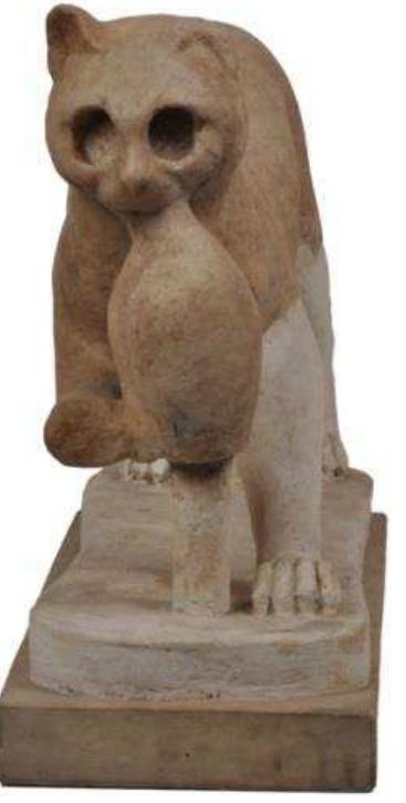 Figure 45. Marble figure of female cat with bird in its mouth, probably from Naukratis, late 4th-3rd century BC. British Museum, 1905,0612.6.  2.9. Terracotta figurines 