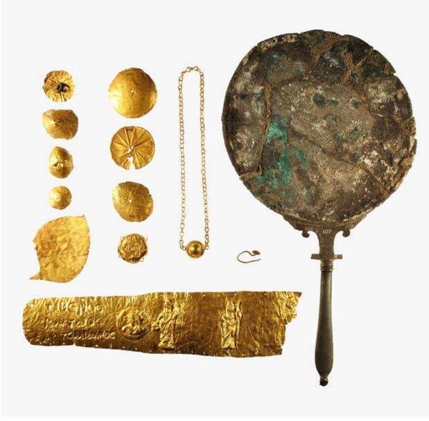 Figure 63. Roman gold jewellery and silver mirror found in a house in the town of Naukratis, 1st century AD. British Museum 1886,0401.1749, 1756-1765. 