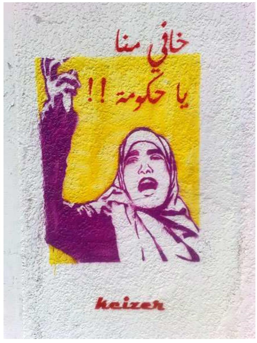 nervous about my work” (KZ, a male full-time graffiti artist, refused to disclose his age). Some graffiti pieces also express this power relation. Figure 4 illustrates this attitude in its portrayal of a woman and the statement “Government, fear us”.  It was challenging to get access to authority figures to understand this actor’s perspective. To get closer access, an interview was done with a 65-year-old retired military official. For him, graffiti represented chaos and obscene language with no real purpose. He saw aesthetic value in few of the pieces and thought the best solution is to neatly erase graffiti and set specific areas where artists can draw in an organized manner. For him, the graffiti artists focus on few cases and insult the government based on them while ignoring the bigger challenges the authority is facing. Another interview was done with a 24-year-old accountant who served his compulsory military year in Tahrir Square area. Even though he was involved in the revolution in 2011, he was very understanding regarding the authorities’ response. He explains how the context has changed much since 2011, and the military has much to resist with the current threats especially in a strategic area such as Tahrir Square.  a hj Sen ee RC ee ee ee: xe KE ee ee ee eT. See te sete ee ee: MT; ST CY een ney nee 