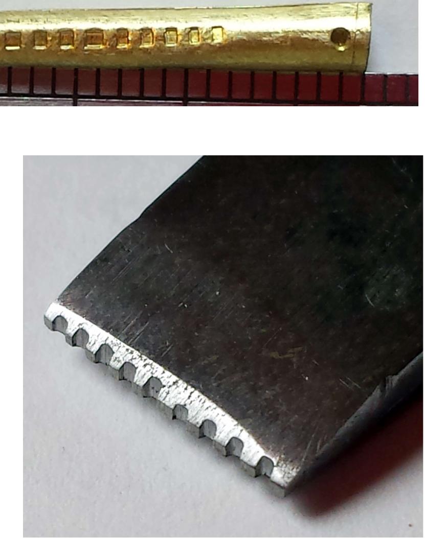A punch to emboss a line of 10 square dots on aiglet blanks