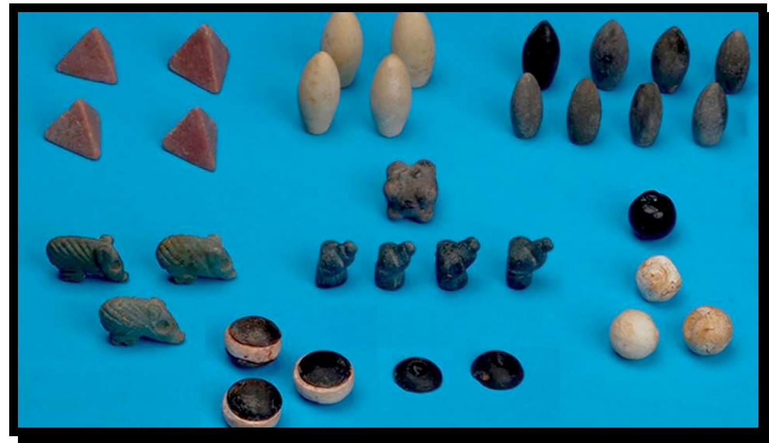 Even if games are supposed to be as old as history of humanity ([8]), or older than humanity (Fagen,1981), historical artifacts and foundlings go back to B.C. 3000. Found in a burial at Basur Hoyuk, in Turkey, 49 small stones sculpted in different shapes and painted in green, red, blue, black and white, is thought to be the oldest gaming tools ([3]). These small carved stones are supposed to be formed between B.C. 2900-3100 and nearly 5000 years old. 