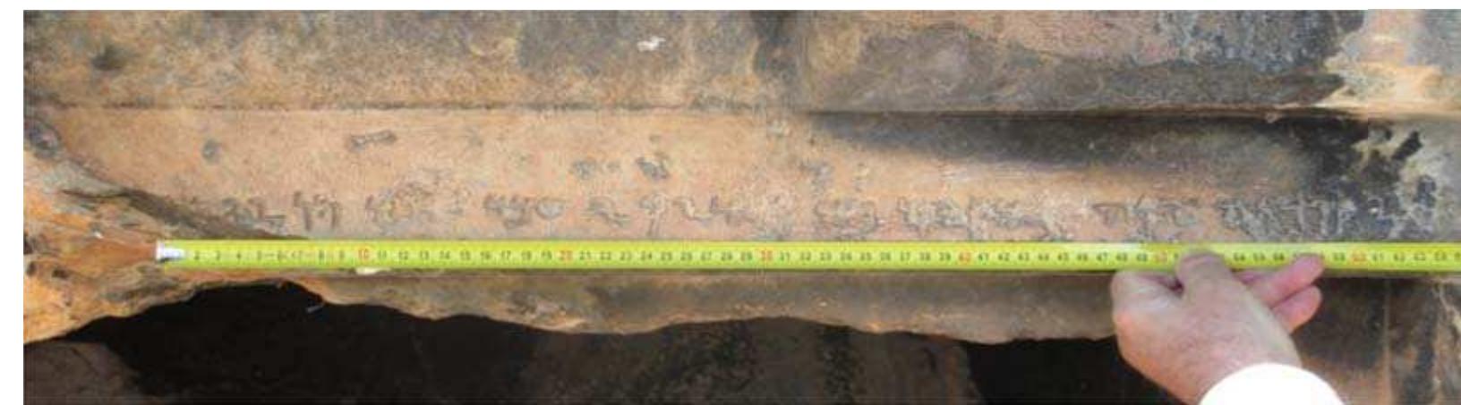 Fig. 9. The Aramaic inscription from Limyra. The first fragment of the inscription before the lacuna (photo by M. Vernet) 