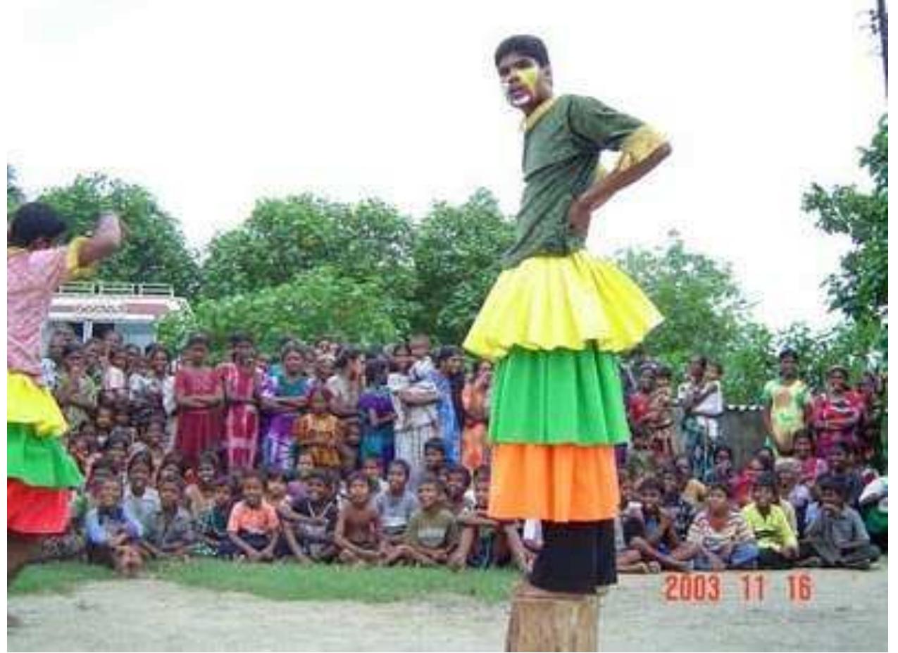 Theatre activities isa good tool to break their silence and make happy by laughing, speaking, Crying and shouting .This kind of theatre activities gives relief to masses with heavy hearts.  Street theatre performance by Active Theatre Movement  They are unable to lay down their burdens through fear. Due to the fear they have to keep thei mouths shut as if they are wearing masks and live in silence.  The people who congregate will soend a few hours happily like those who are in heavy burdens. This theatre is actually giving relief to those affected by mental stress. 