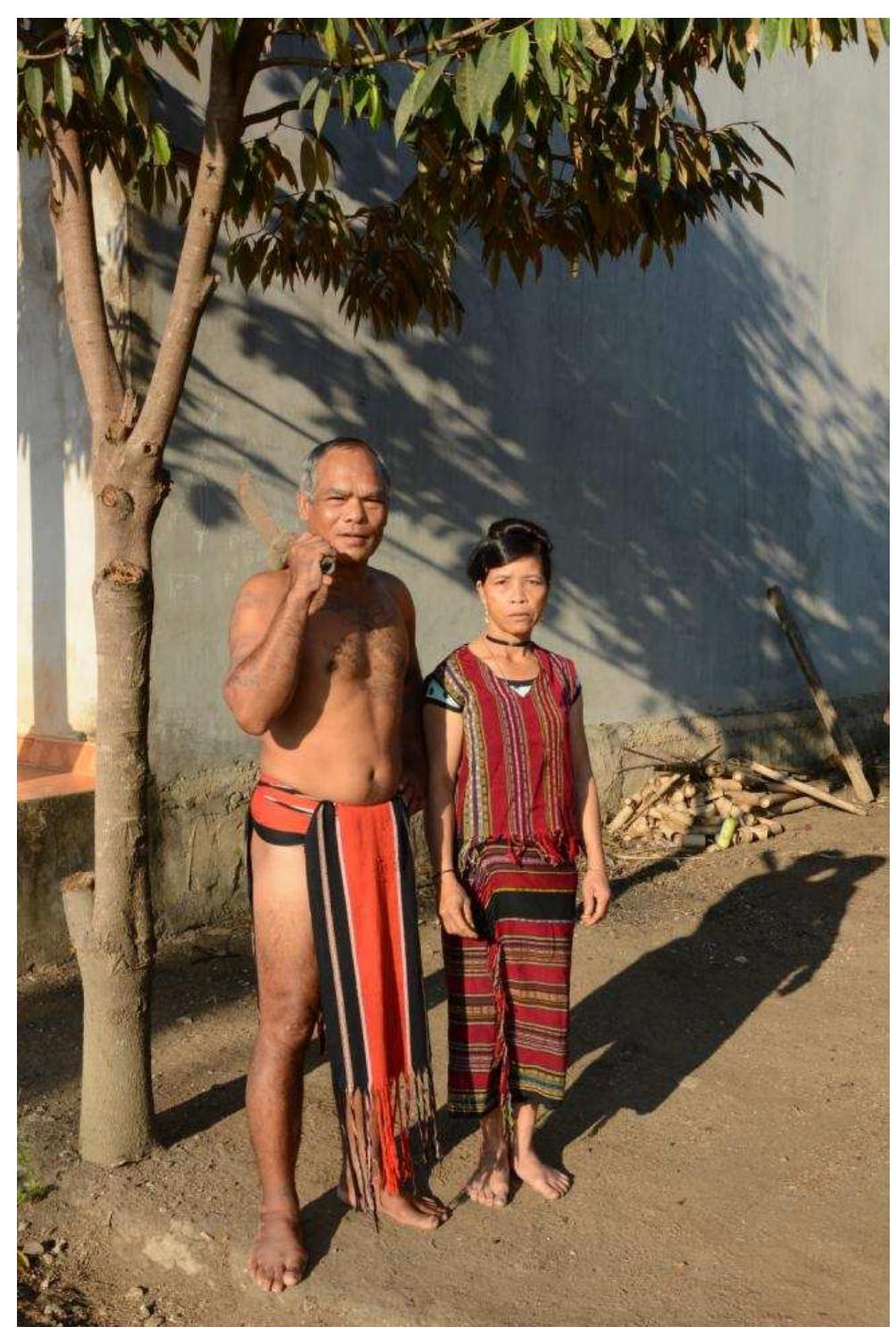 Thao la and his w fe in brau traditional costume curing sick