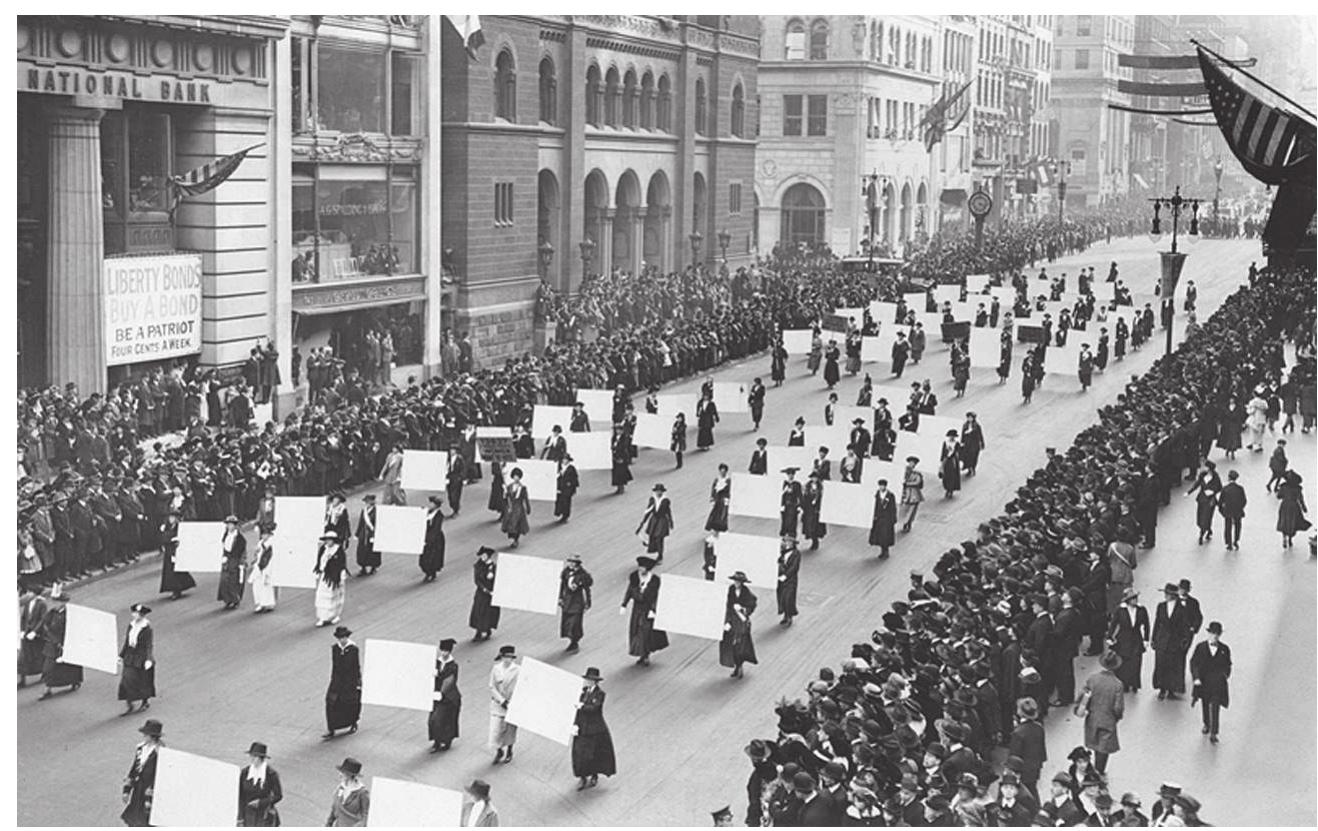 Fig. Intro.1. Suffragists “march in October 1917, displaying placards containing the signatures of over one million New York Women demanding the vote.” (New York Times Archive.) 