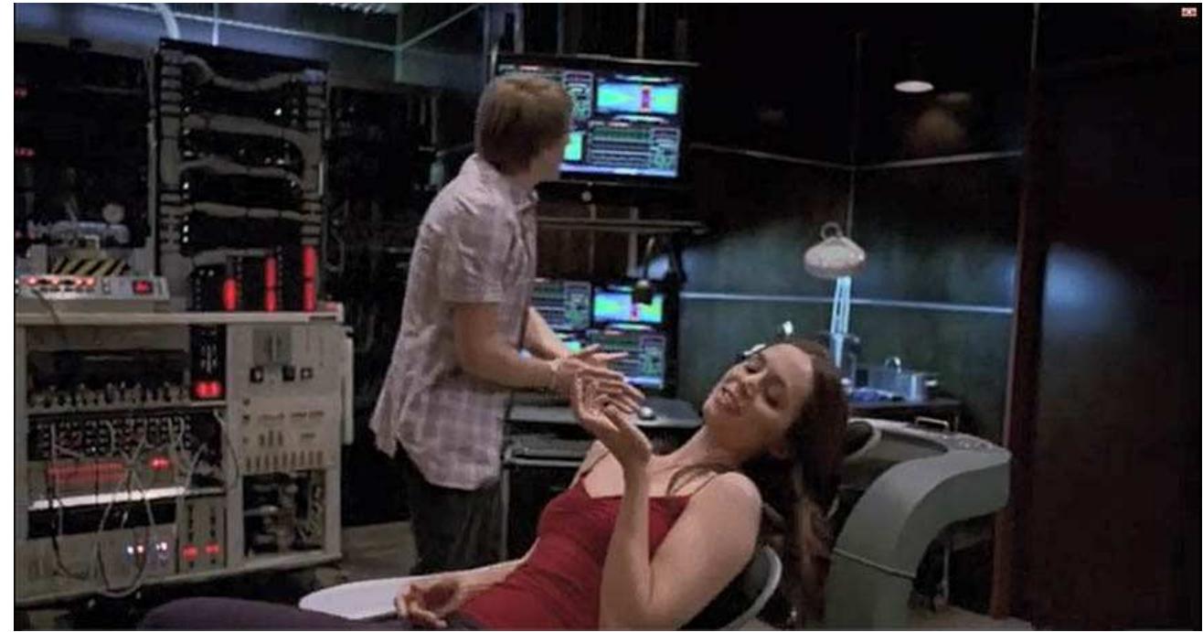 Figure 1: Female Active looking fondly at a necklace she received during an assignment, moments before her mind is wiped and she returns to her doll state. See Dollhouse, Season 1, Episode 1: ‘Ghost”. First broadcast 13 February 2009.  The scene described above establishes a central premise of Dollhouse: that it is  imprint it with new memories, abilities, and personali  t becomes clear later in the series that while Actives at t  possible to wipe a human brain clean (not unlike a computer hard drive) and later  ies. The reverse playback  of memories is a visual representation of the extraction process, which leaves he female Active in what the show calls a doll state. This is a state of immense vulnerability, as all critical sense and personality is stripped from the individual, eaving the Active with only a basic set of skills that allows them to function and interact with staff and other Actives until they are imprinted again for a new task.  he Los Angeles Dollhouse  are in a doll state, they—like Echo—are all named after letters in the NATO  alphabet. 