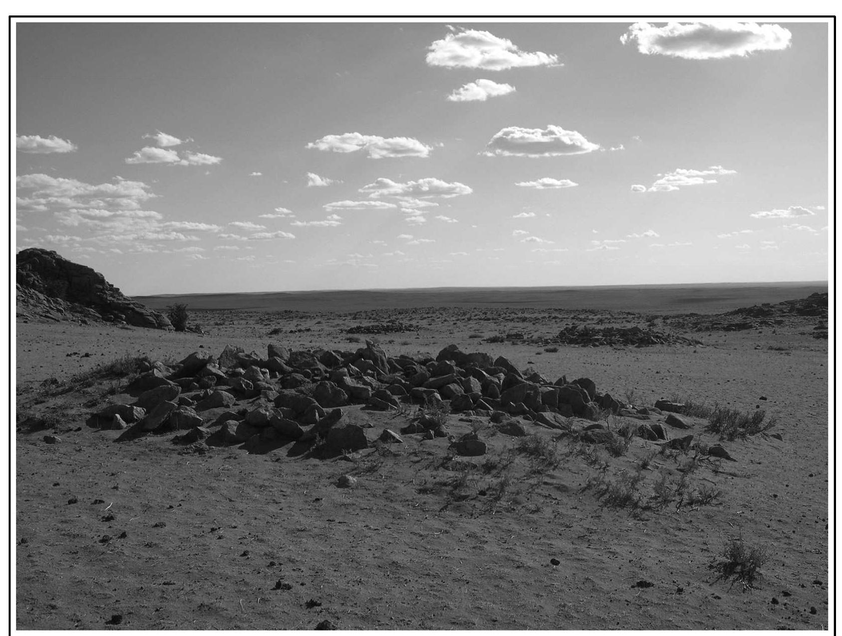 Plate 4. Khirigsuur feature with a stone circle surrounding the central stone mound 