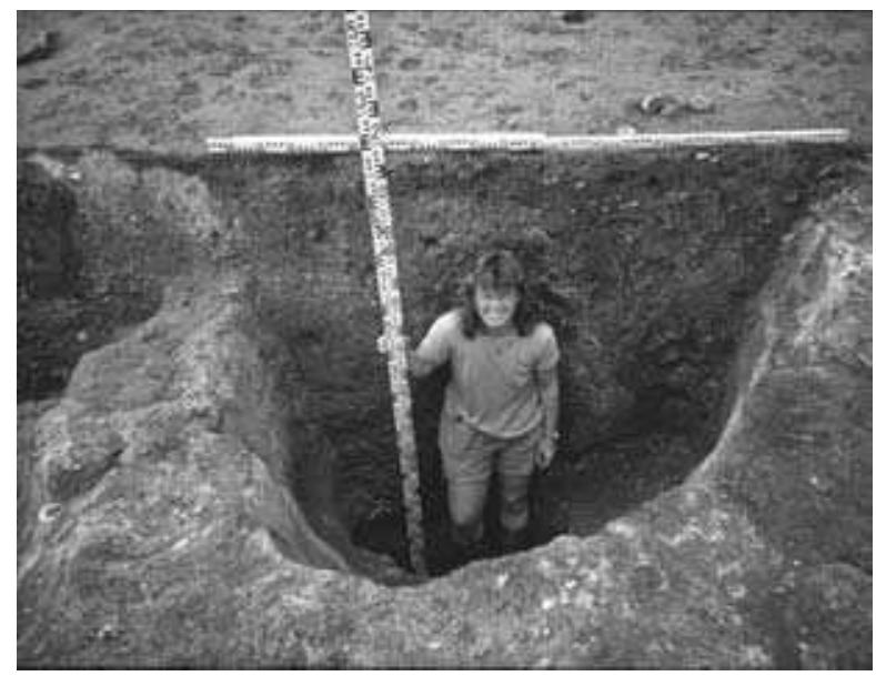 Figure 4. The holes for the roof-supporting posts, like this one in the north-western part of the building, were about 2m deep.