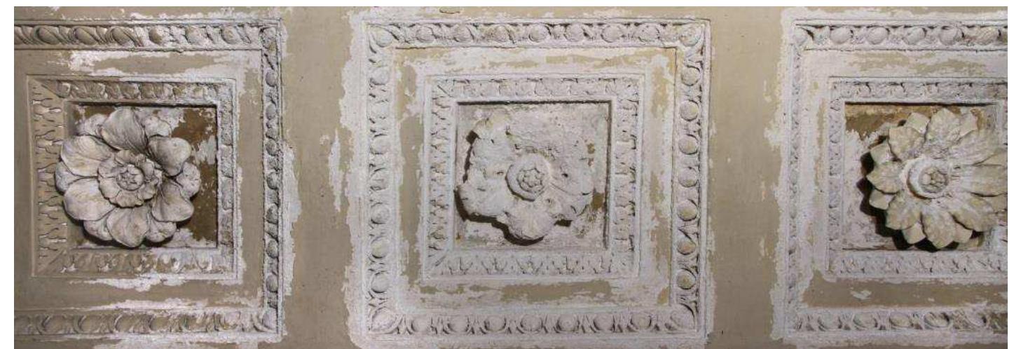 Fig. 1 — Picture of decayed high-relief stucco flowers 