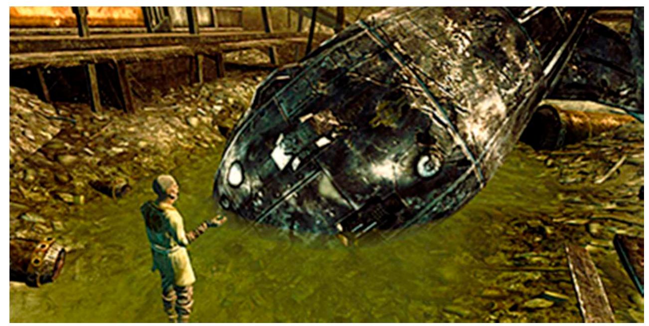 Figure 1. Confessor Cromwell preaching and praying next to the atom bomb.  Here, Atom is said to come and divide our cells, ending our earthly suffering. Atom is present anywhere, from the “infinite worlds” inside our every cell, to the huge radiation storms, powerful ecological consequences of the nuclear fallout that plagues the wasteland. Thus, the Church was created and fortified in Megaton where its first settlers took shelter in the crater in the 23rd century—and it has spread across the United States since then, as the appearance of the Church attests to in various places in Fallout 4, which takes place barely 10 years later. 