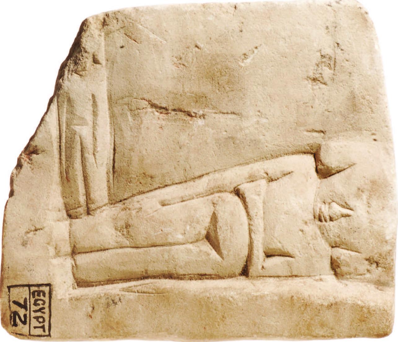 Fig. 15. Limestone relief of reclining woman with child standing by her feet, from the town area of Naukratis, ca. 6"*-5'" century BC. Bolton Museum, 1966.88.A (Photo: © Bolton Library and Museum Service). 