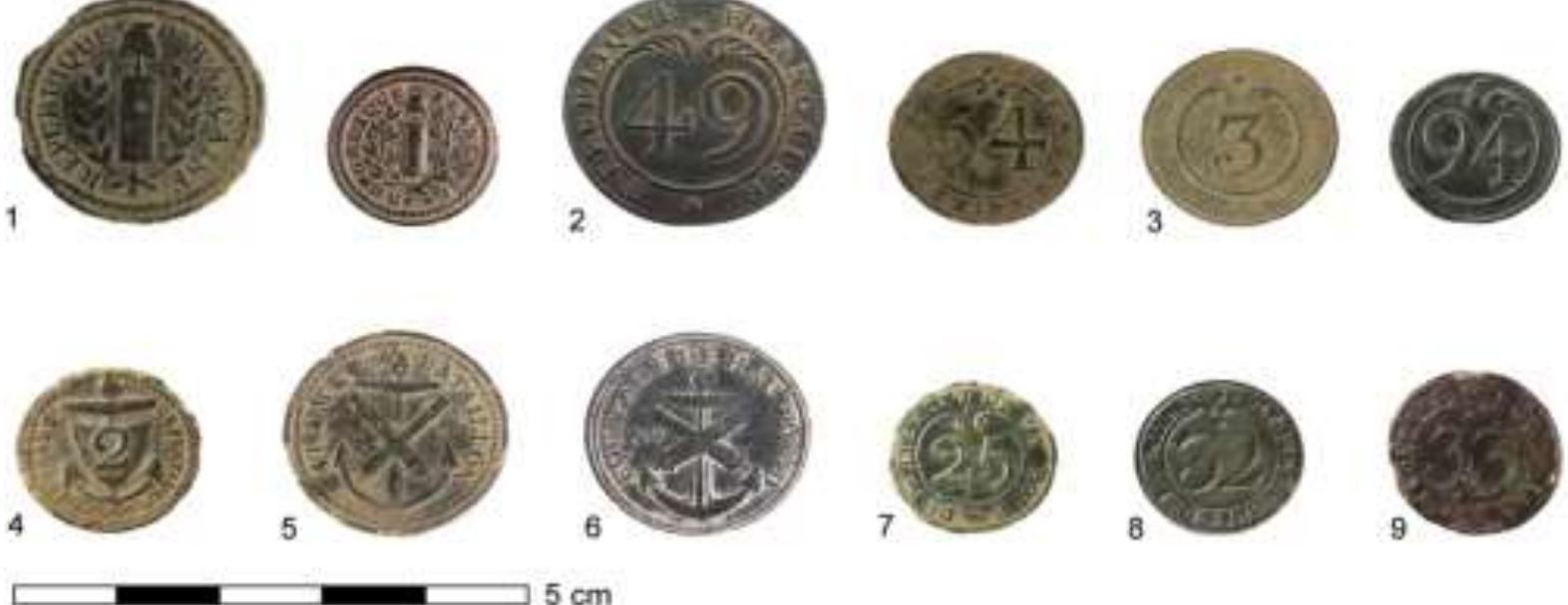 Figure 6: Some examples of the button types mentioned in the text. (1) revolutionary buttons with fasces, Phrygian cap and caption République Francaise, 1792-1793; (2) buttons with regimental number and caption République Francaise, 1793-1803; (3) buttons with regimental number without caption, 1803-1814; (4) Navy, Equipage de Flotille, circa 1805; (5) Navy, 1809-1810; (6) Navy, Equipage de Hautbord, 1810-1814; (7-9) Gendarmerie buttons of the Département de la Roer, Département des Bouches de la Meuse and Département de L'Ems Occidental. Source: PAN. 