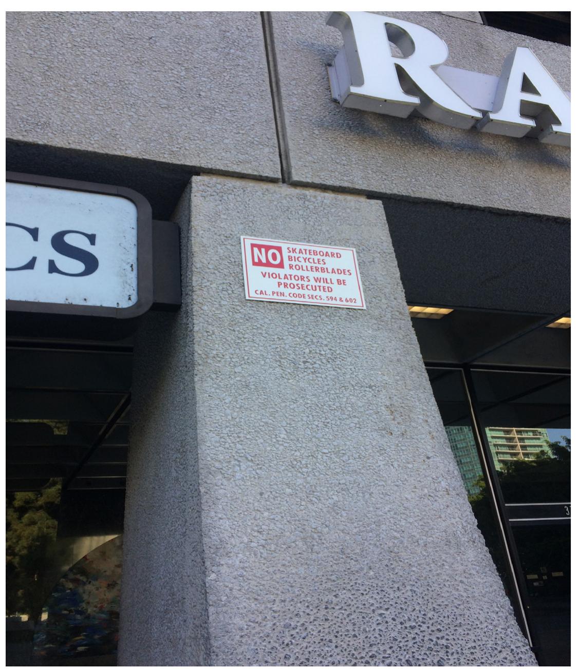 Figure 4: Private Signage  Private regulations ban certain populations and uses. Photo by Chris Giamarino 