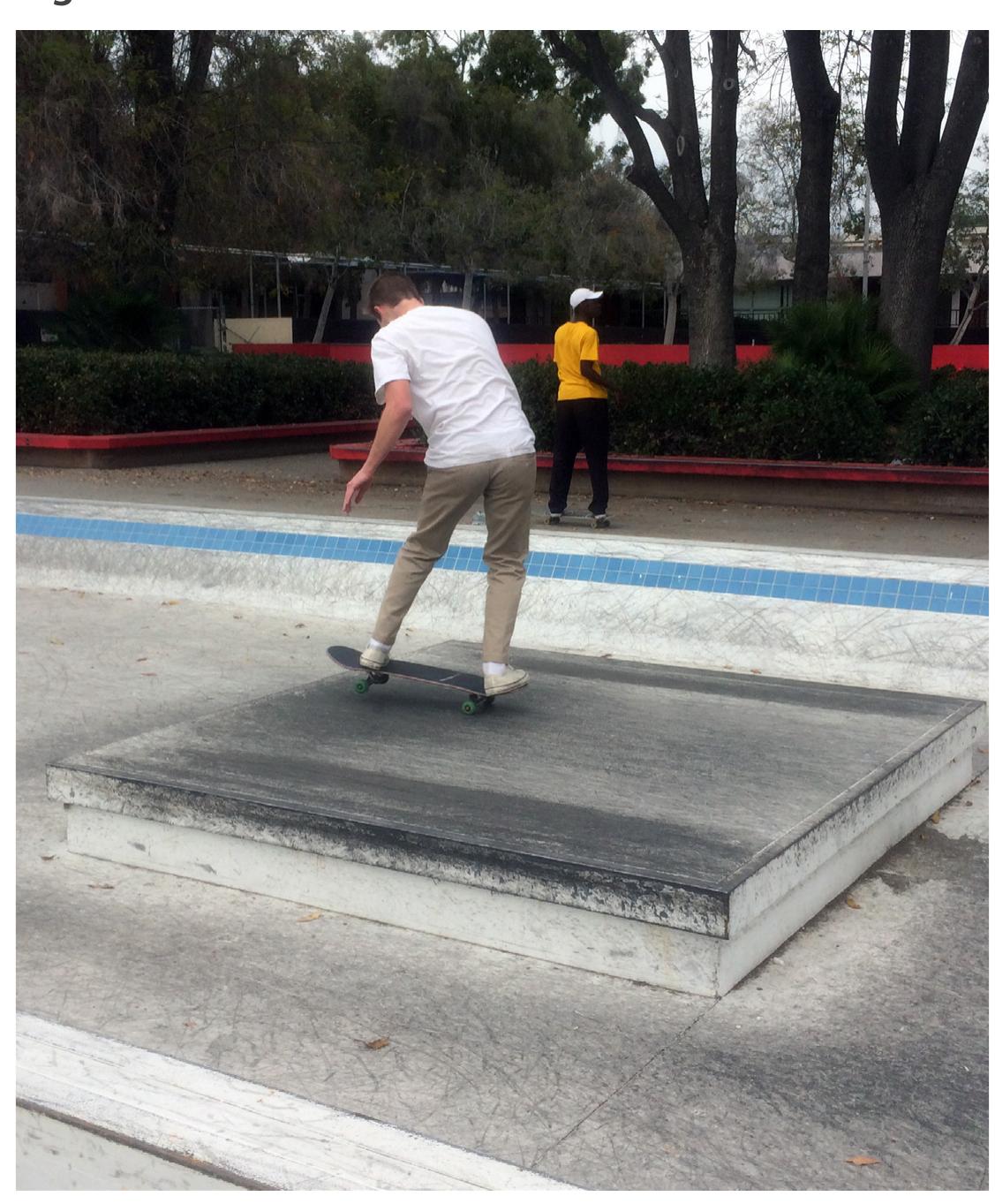 Skater manuals in drained fountain. Photo by Chris Giamarino. 