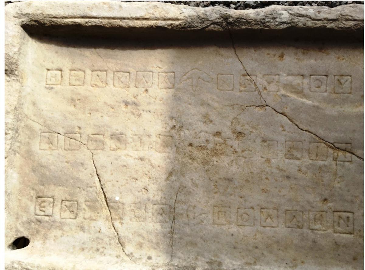 Fic. 3. Duodecim scripta board from Ephesos (courtesy of Willy Clarysse).  written into the square markings of the field (Fic. 3).*° It was found near the Celsus Library, in the eastern portico along the Marble Street.” The example from Ephesos reads: H tabla * xrycou / Apolia * terpsin / Echouca * pollén (“The ruinous golden table, bringing much delight (?)”). No description of the board or its find context is provided, nor any date, though the lunate shape ot the letters epsilon, sigma and omega suggests a Roman Imperial origin. 