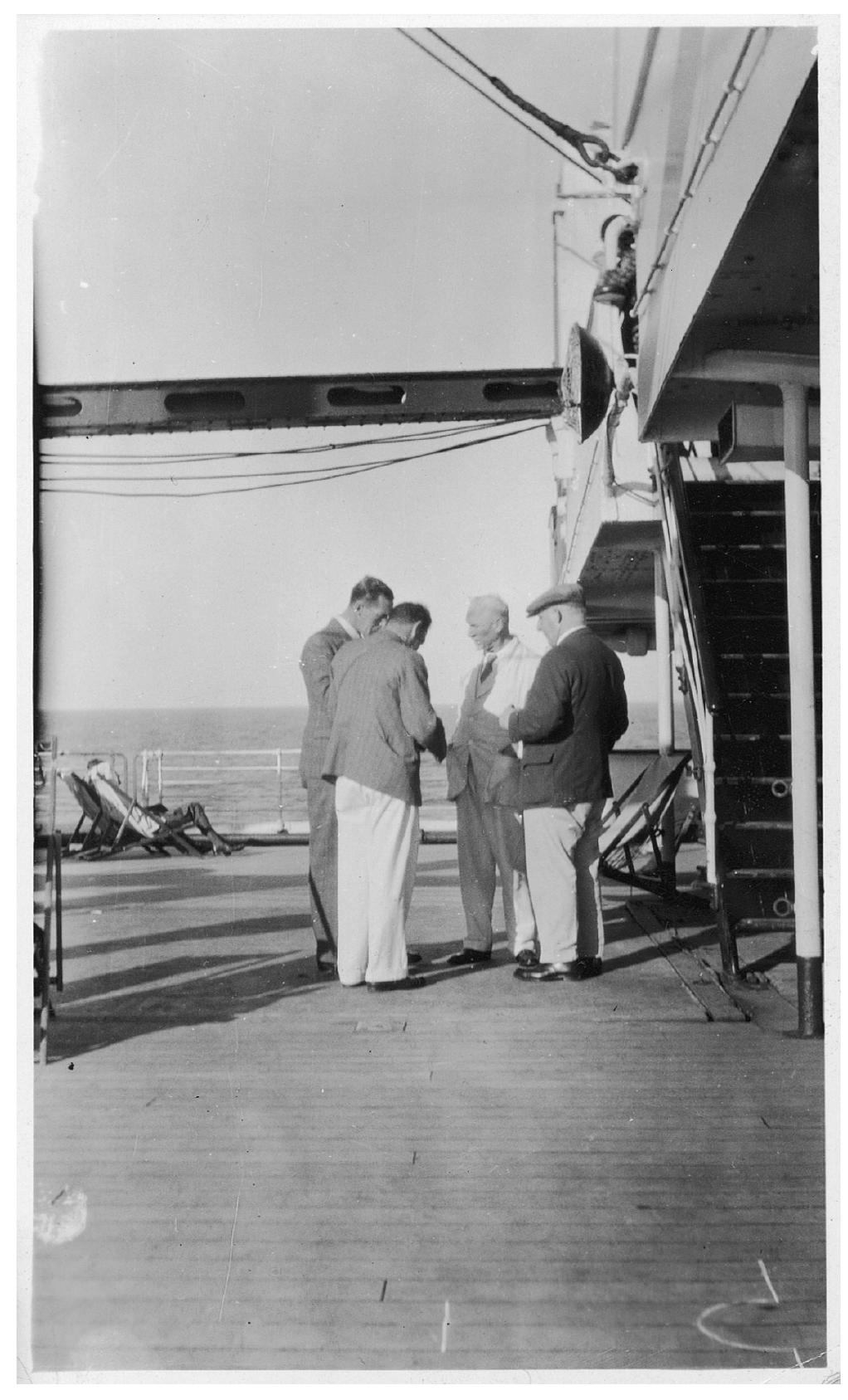 FIG. 1. Field Marshal Jan Smuts (centre) conversing with C. van Riet Lowe (left) during a 1931 transatlantic voyage (RARI Archives, University of the Witwatersrand).  Making the most of an electoral setback, Smuts found himself free, between 1924 to about 1935, to pursue his philo- sophical and scientific interests in geology, botany and prehis- toric archaeology. Smuts’ interests were particularly broad- ranging: he is notably credited with introducing the term ‘holism’ from philosophy and popular psychology, and also with some prescient and innovative views on the phenomenon of globalisation. At the same time, his scientific agenda was thoroughly invested and strategic, geared first and foremost to promoting the renown and stature of his country. Addressing the 1925 meeting of the South African Association for the 