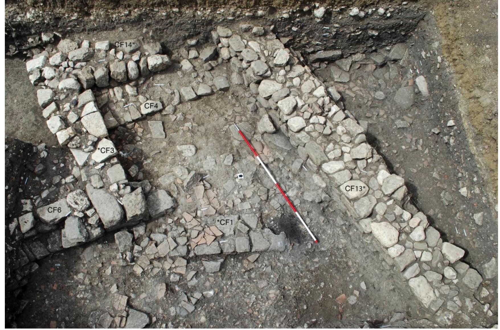 Fig. 11. Casale San Pietro, Int 5. Successive walls of Roman (CF1), Byzantine (CF3), Islamic (CF4, 6) and Norman (CF13) date viewed from the east. The location of the Islamic-period tabouna lies between the end of CF1 and the ranging pole. (Meo).  Carver — A. Molinari — V. Aniceti — C. Capelli — F. Colangeli — L. Drieu — G. Fiorentino — F. Giovannini - M. Hummiler — J. Lundy — A. Meo — A nnereau — P. Orecchioni — M. Primavera — A. Ughi e SICILY IN TRANSITION — New research on early medieval Sicily, 2017-2018 