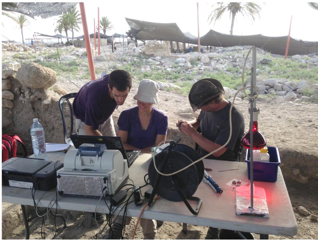 Figure | The on-site microarchaeological laboratory in operation in Area Q, Megiddo.  Traditionally, many of the “micro” methods used in archaeology were developed in the earth sci- ences, with the one glaring exception of '*C dating, which was first applied to archaeology. With the new agenda of revealing as much as possible of the archaeological record in real time during the excavation (Figure 1), a method has an added value if the information can be obtained within a few minutes on site, or even from one day to the next, still during the active excavation. This is a unique requirement for archaeology, and thus new methods have to be developed specifically for these pur- poses. In our project, we developed several methods to enhance the on-site tool kit. 