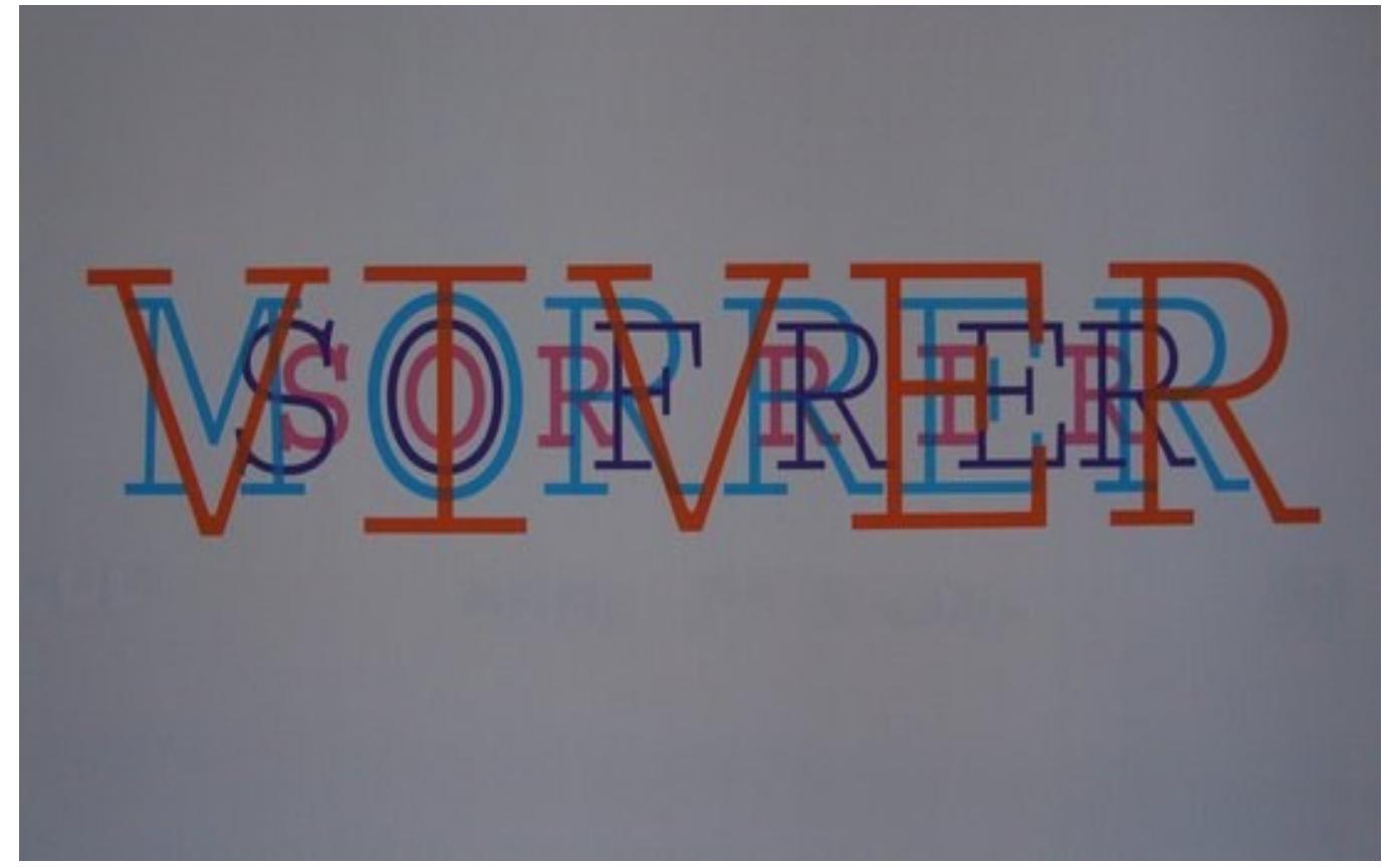 This poem is an ideogram made up of four words piled on top of one another, /ve — smile — suffer — die in English, or, in terms of letter size, vier — morrer — sorrir — sofrir [live — die — smile — suffer]. In other words, you have morphological units with a shared structure, suggesting the semantic unity of a life cycle: to live, to smile, to suffer, to die—these acts form one continuity.  Here is a more complex example, the well-known “Cidadecitycité,’” made up of a long undivided line of word roots that might end in the suffix —cidade, -city, -cité in. Portugese, English, and French, respectively. 