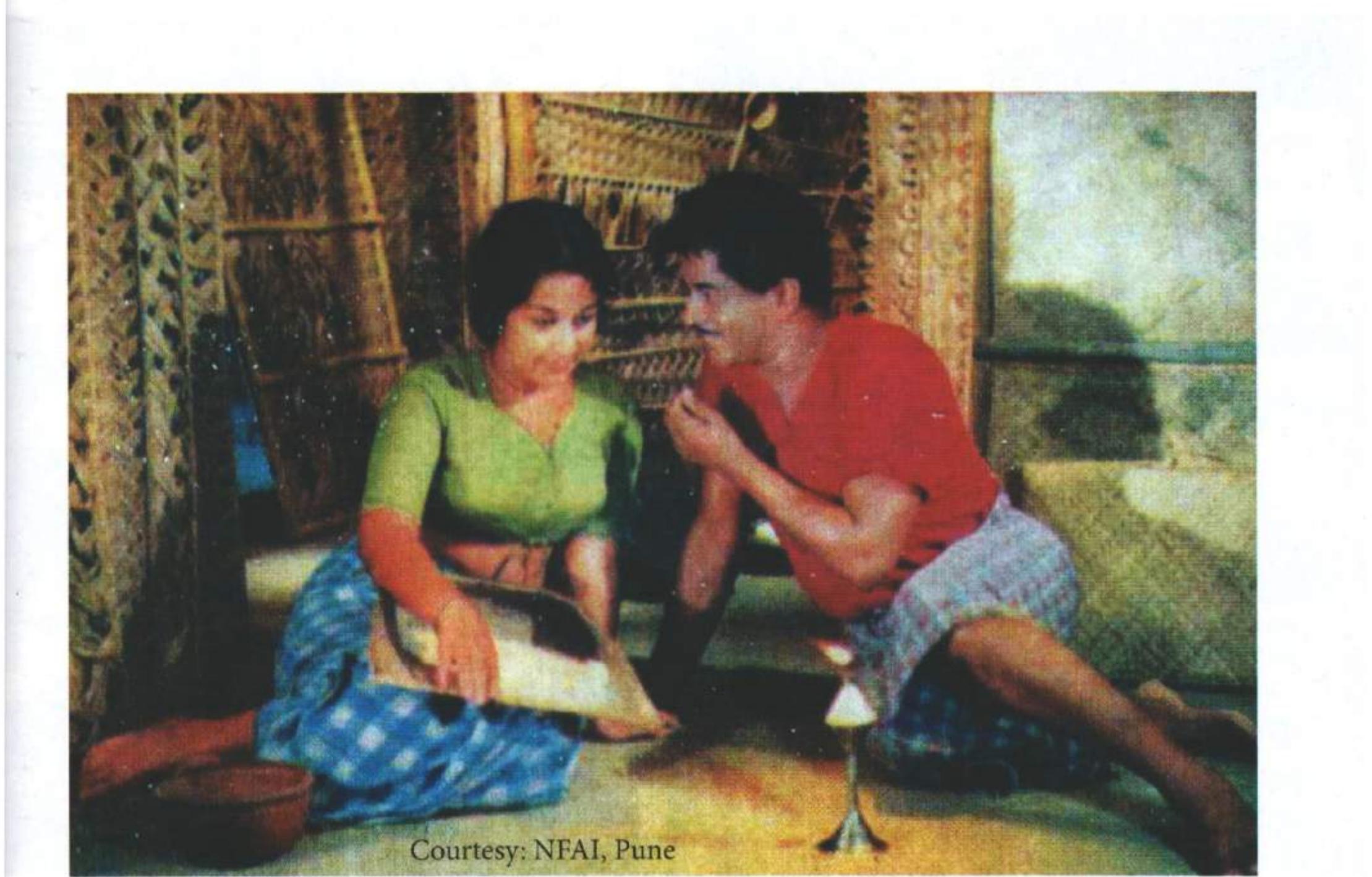 song sequence in constructing the figure of the ‘nirasha kaamukan or the disillusioned  (male) lover.  first and boldest in the ttle credits, with Madhu’s coming third, after both Sathyan and Kottarakkara Sreedharan Nair, who played Chembankunju. The difference in the two actors’ star value can also be seen in their remuneration: reportedly, Madhu was paid Rs 2,000 for the role, whereas Sathyan was paid Rs 12,000. The casting choice imbues Palani with a maturity that is absent in the novel (apart from being an ~ established star of the industry, Sathyan was in his fifties when this film was shot), and Pareekkutty with an aura of the brooding, melancholic intellectual. The latter was associated with Madhu’s screen persona, which was shaped as much by his educational background that set him apart from other stars of the time (Madhu was an alumnus of the Benares Hindu University and the National School of Drama) as by his recent success in Bhargaveenilayam (directed by A. Vincent, 1964), where he portrayed a novelist staying in a haunted house, obsessed with uncovering the true 