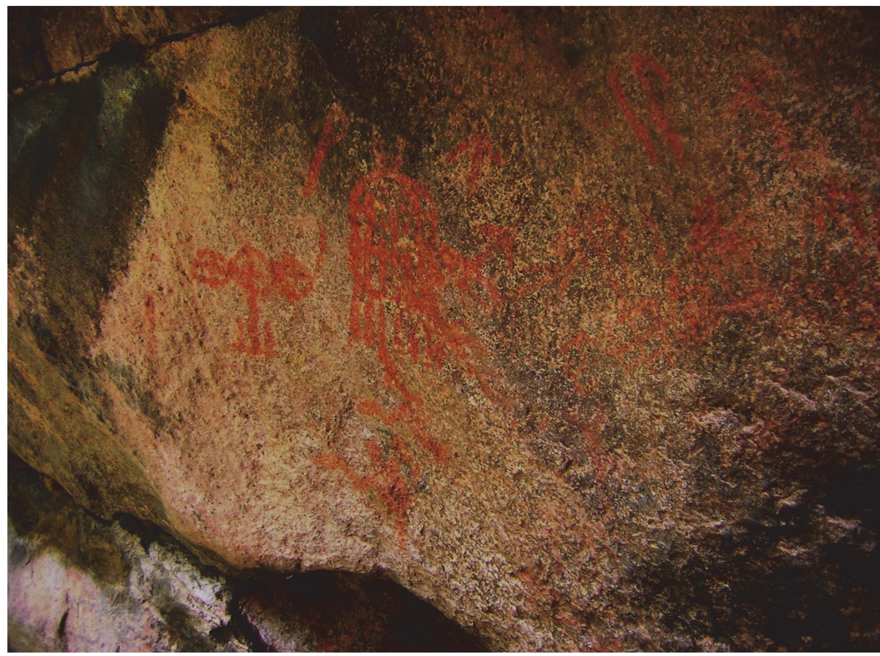 Figure 30: Doli like motif, Bandrauli  In another painting (Figure 26), three leopard like animals are shown possibly climbing a tree. Two of the animals are drawn facing each other. In another frame (Figure 27), there is very interesting depiction of the unique motifs of these cave groups. A quadruped animal is shown as being hunted between two such peculiar motifs whereas the third motif in the frame is seen behind to the left. This scene opens the possibility of this motif as being representation of a human being with some unique bow like instrument in hand. A cart cannot have so many projections in the wooden frame as in some cases these are reaching nine. Or else these motifs have to be considered purely ritualistic. In another depiction (Figure 28) two animals painted in red are visible but their identification is not possible. 