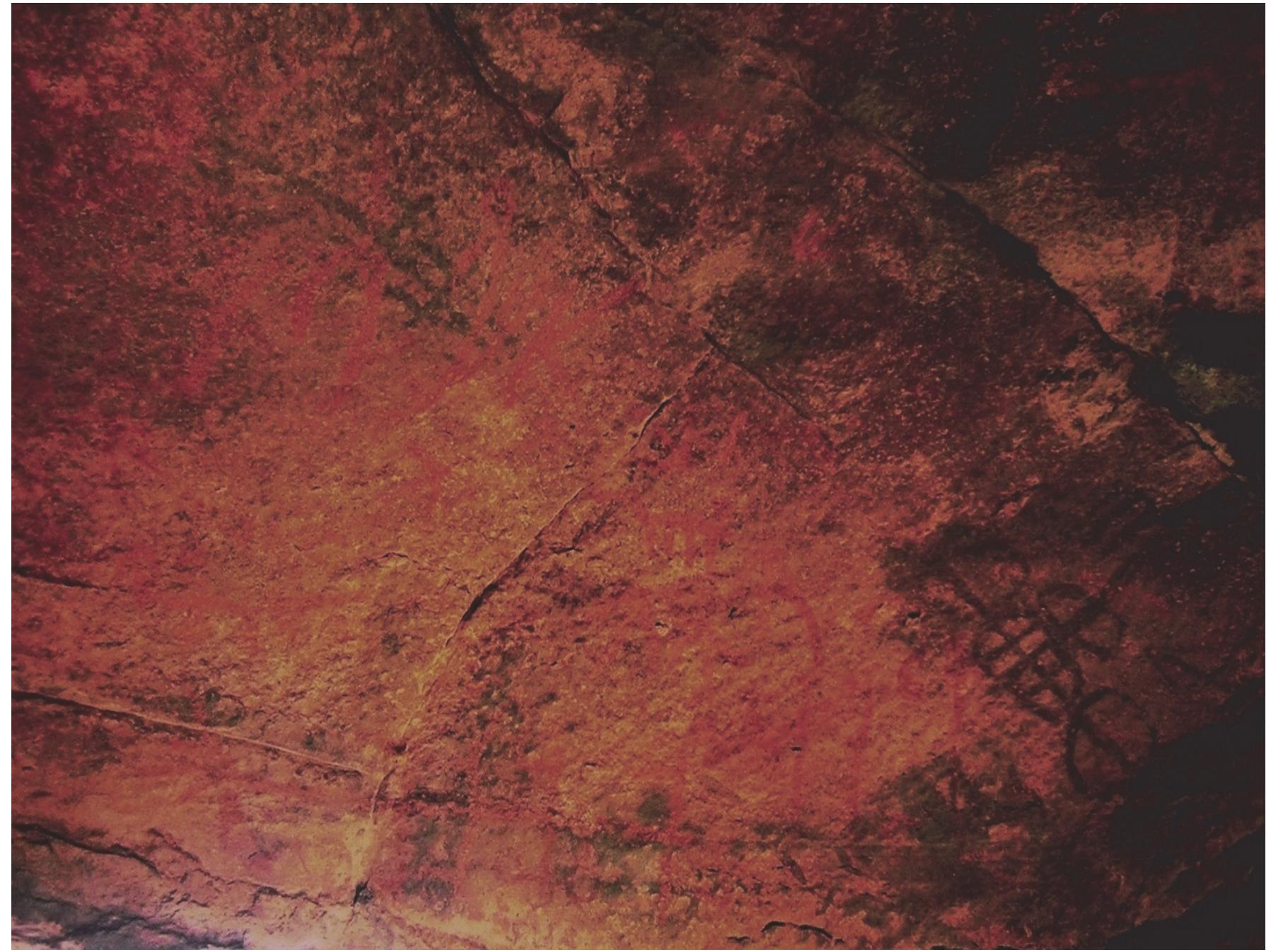 Figure 31: Human figures, Bandrauli  Mallurdauls This rock shelter group is situated about 6 km to the north-west of Fatehpur Sikri. Bandrauli village is situated slightly to the south-west of the shelters and Sonothi village to the north. Sonothi is quite an extensive PGW culture onwards site with every possibility of the presence of OCP. In fact PGW sherds are scattered from Sonothi village up to the base of rock shelters, that’s why the author during his first exploratory visit considered these rock shelters as belonging to Sonothi village. There are three rock shelters on the top of hill at its eastern end but only Rani ka Chhajja or Rani ka Khatola has extensive paintings. It measures about 8 x 2.5 m. The approach to the caves (Figure  29) is very difficult and the author hardly could get out from it. The majority of the paintings in this shelter are in red pigment and only few in black. The shelter derives its local name from the larger painting in the shelter (Figure 30) which looks like a doli or udankhatola (spaceship) in first appearance. On closer examination, it appears to be a religious structure either a stupa or a temple. An ankusa like ayudha is depicted above this figure to the left. Below this structure like figure are shown two or three human figures. To the left of this figure is shown the peculiar cart like motif of this whole group. It has three circular discs, each having two intersecting lines cutting at right  angles. Towards the down side is the projection with two smaller projections. Various arrows are shown hitting in different directions; one is coming out of a bow like object shown near the structure.  arrows are shown hitting in different directions; one is coming out of a bow like object 