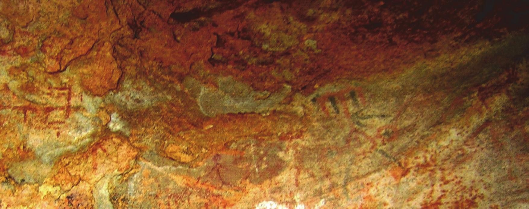 Figure 36: Painting, Madanpura  red colour with a dividing line is seen. On the right a quadruped animal with a long tail in red colour is seen. In the middle, few obliterated figures are seen along with the unique motif of this entire group. Here, interestingly, the motif in black colour is superimposed by the same motif in red colour. Two lines in black colour are also seen merging with the circular disc of the motif. A black colour arrow is hitting the motif. In another frame (Figure 37), a number of arrows in red colour are seen. To the left, a yogi like figure is seen seated cross legged, holding a snake or rosary like object in his right hand. Pradhan (2015: 133) has wrongly identified it as a boat like motif. Other subjects in the frame are quite obliterated, though in the lower side, a humped bull can be identified. 