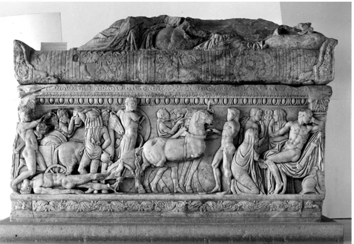 Fig. 7: loannina, Archaeological Museum Inv. 6176. Attic Achilles sarcophagus. The front side shows the ransom of Hector, with Priam kneeling before Achilles. On the left small side Achilles is being armed in the presence of Thetis, the right small side shows the lying-in-state of Patroclus. The kline lid depicts a reclining couple. From a tomb in Ladochori/Igoumenitsa, which contained several other sarcophagi. Late 2nd cent. AD (Photo: InstNeg Athen 1993/266 (von Eickstedt). 