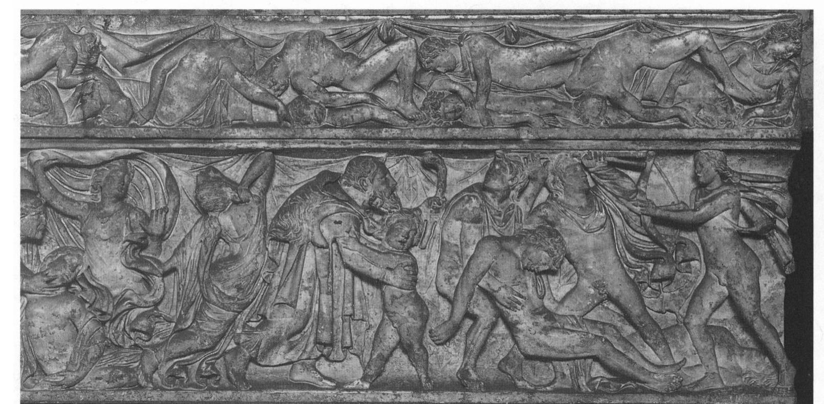 Figure 4. Slaughter of the Niobids on a sarcophagus, mid-second century c.e. An old pedagogue tries to protect the youngest son from the arrows of Apollo (right), while one Niobid attempts to drag his brother out of the killing zone. The lid shows the corpses of the killed youth arranged in  two layers. Glyptothek, Munich. Photo: Hirmer. 