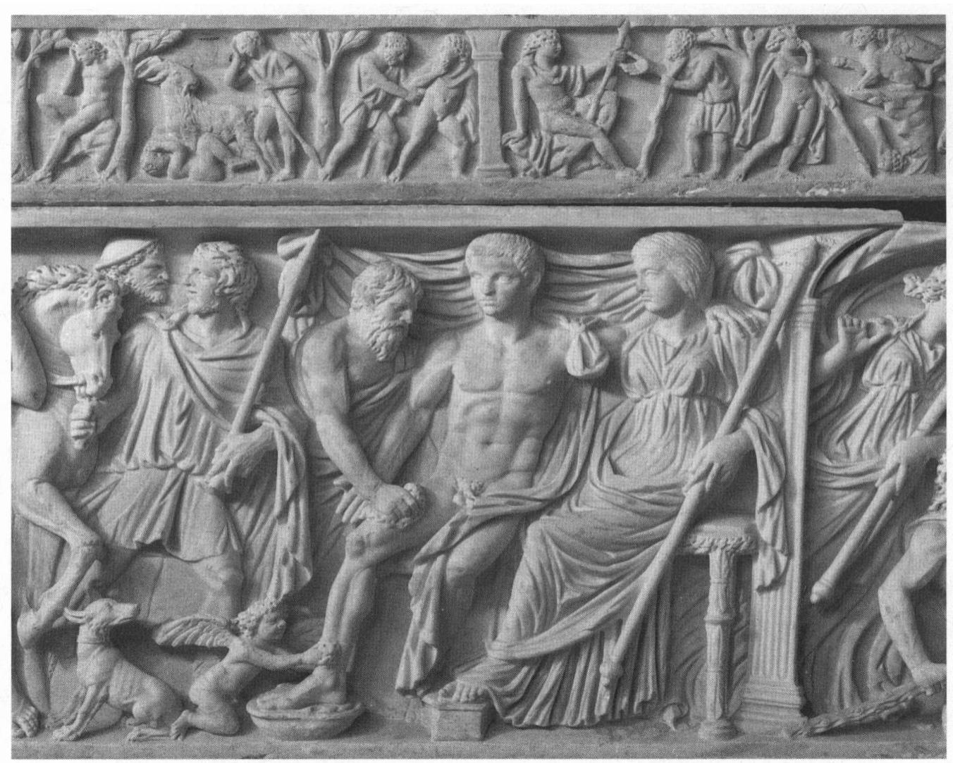 Figure 9. Central scene of an Adonis sarcophagus, ca. 220-230 c.e. Adonis  puts his arm around Aphrodite (with scepter). The heads are equipped with the portraits of a couple, or of mother and son. Adonis’s wound is tended to by a bearded philosopher-physician and a little Eros, who washes the blood from the leg over a basin. Musei Vaticani, Museo Gregoriano Profano, Rome. Photo: Inst. Neg. Rom 1971.1760 (Singer). 