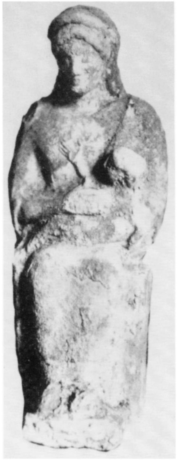 Fig. 8. Demeter with child in lap. Statuette from the Demeter Malophoros sanctuary at Selinus. (After G. Zuntz, Persephone {Oxford 1971] pl. 21c, from MonAnt 32. Courtesy Accade- mia Nazionale dei Lincei, Rome) 