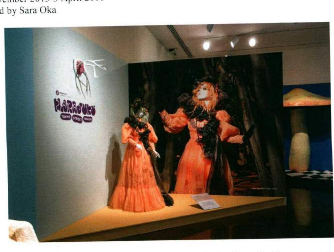 Image 1: Installation shot, Harajuku: Tokyo Street Fashion. Photo © Honolulu Museum of Art, Honolulu/Shuzo Uemoto  In Takashi Kitajima’s 1997 suspense fiction novel Owakare ni Bloody Mary, set in Hawaii, a fifth-generation Japanese Hawaiian in her 20s criticises a teenage female tourist from Japan for being too fashionable in her black punk costume, advising her that it was unfashionable to be fashionable in Hawaii. By the end of story, the punk girl wears 