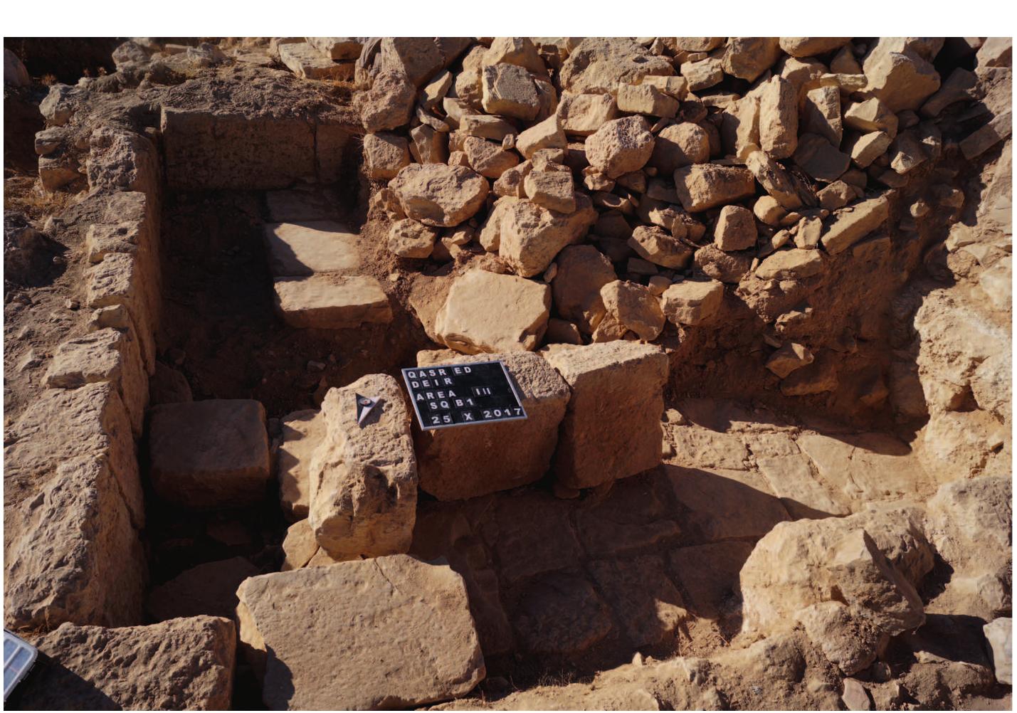Fig. 7. Structure added to the building from the east — stone slabs on the floor (photo by A. Ochat-Czarnowicz)  Cemetery 