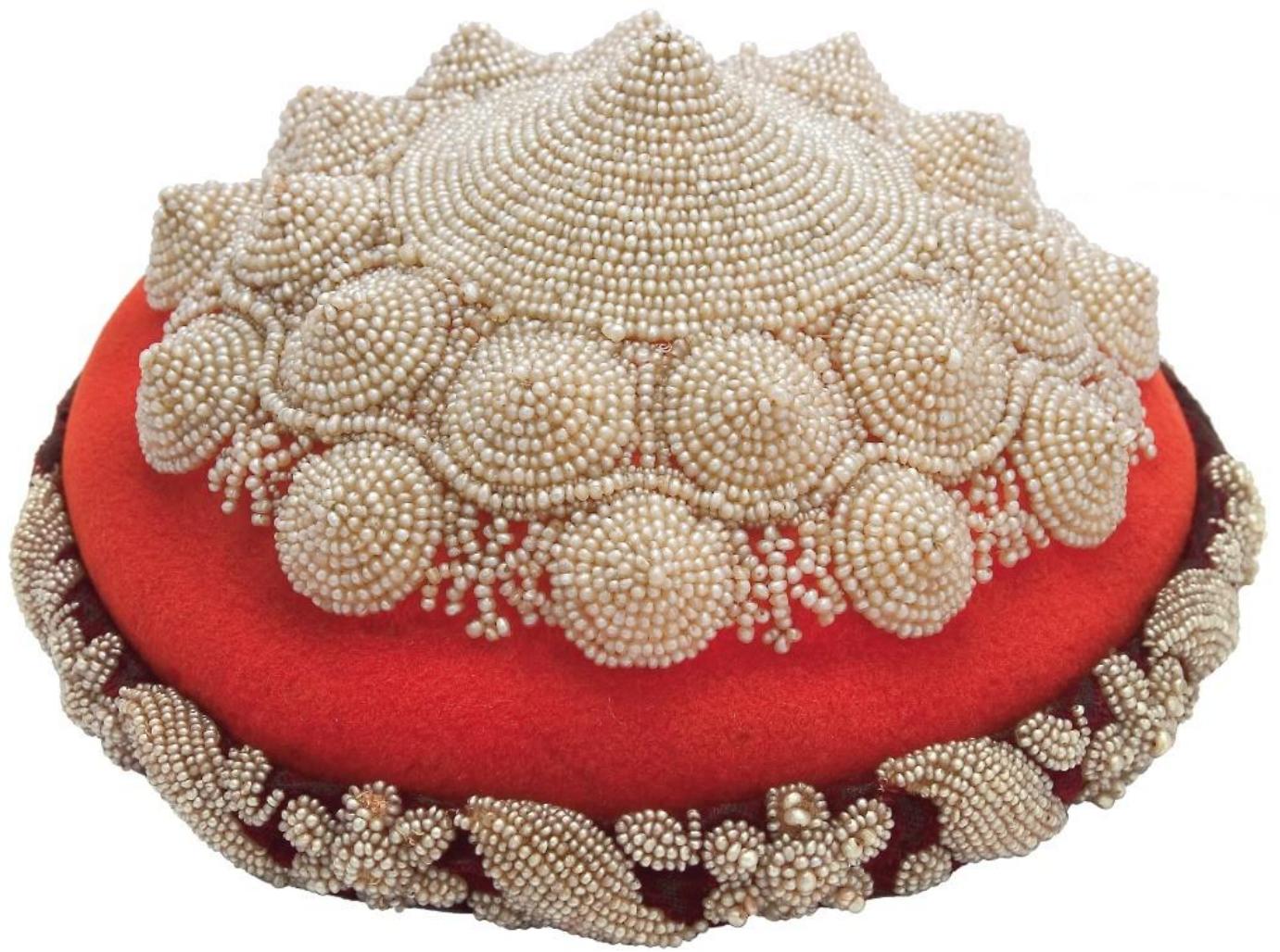 After the transition to modern dress, some elements of traditional urban dress continued to be used in Serbia throughout the 19'" and the early 20" century as a part of the national costume, worn on special occasions. In the new context, the traditional elements were reinterpreted as symbols of the national tradition and the rising bourgeoisie (Prosi¢-Dvorni¢ 2012: 18-21). The most distinctive elements of women’s national costume were tepeluk, a fez-like beaded cap (MAA Accession Nos. 980, 1951, and 15538), and /ibade, a short jacket with long flared sleeves (MAA Accession Nos. 947, 948, 1372 et al). The national costume was the most common dress of choice when sitting for a painted portrait or going to a photographer's studio.  Figure 3: Tepeluk, Serbia, the second half of the 19th century. Photo: Hranislav Mirkovié / © Museum of Appliec Art, Belgrade. 