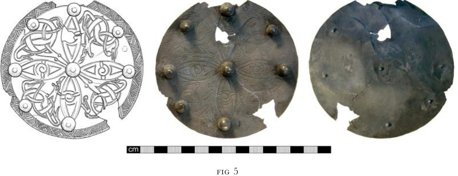 The Bredfield late Saxon disc brooch. Drawn by D Wreathall. © Suffolk County Council.  The Bredfield brooch is a hammered sheet-silver disc brooch of late Saxon—Viking date that belongs to a contemporary class of disc brooch with applied bosses and incised decorative elements. It has nine applied bosses: one at the centre and eight evenly spaced around the periphery of the plate. Post-depositional damage to one of the peripheral bosses, resulting in its detachment from the brooch, demonstrates the bosses are hollow 