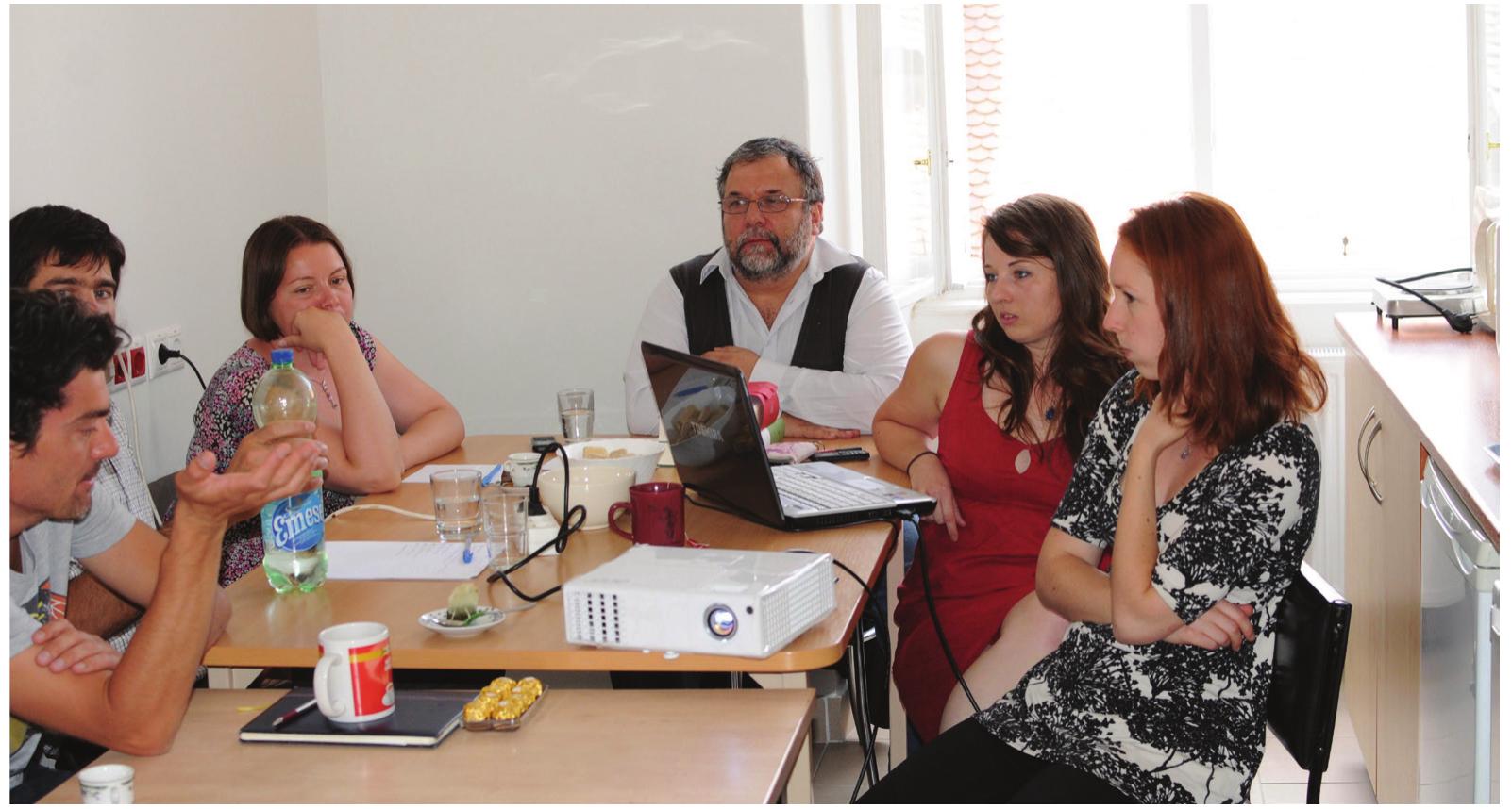 Fig. 2. Adebate on one of the workshops of the group, 27.06.2014. (From left to right: Tibor Akos Racz, Daniel Popity, Ildiké Katalin Pap, Miklos Takacs, Szabina Merva Rozalia Bajkai) (Photo: Gergely Csiky) 