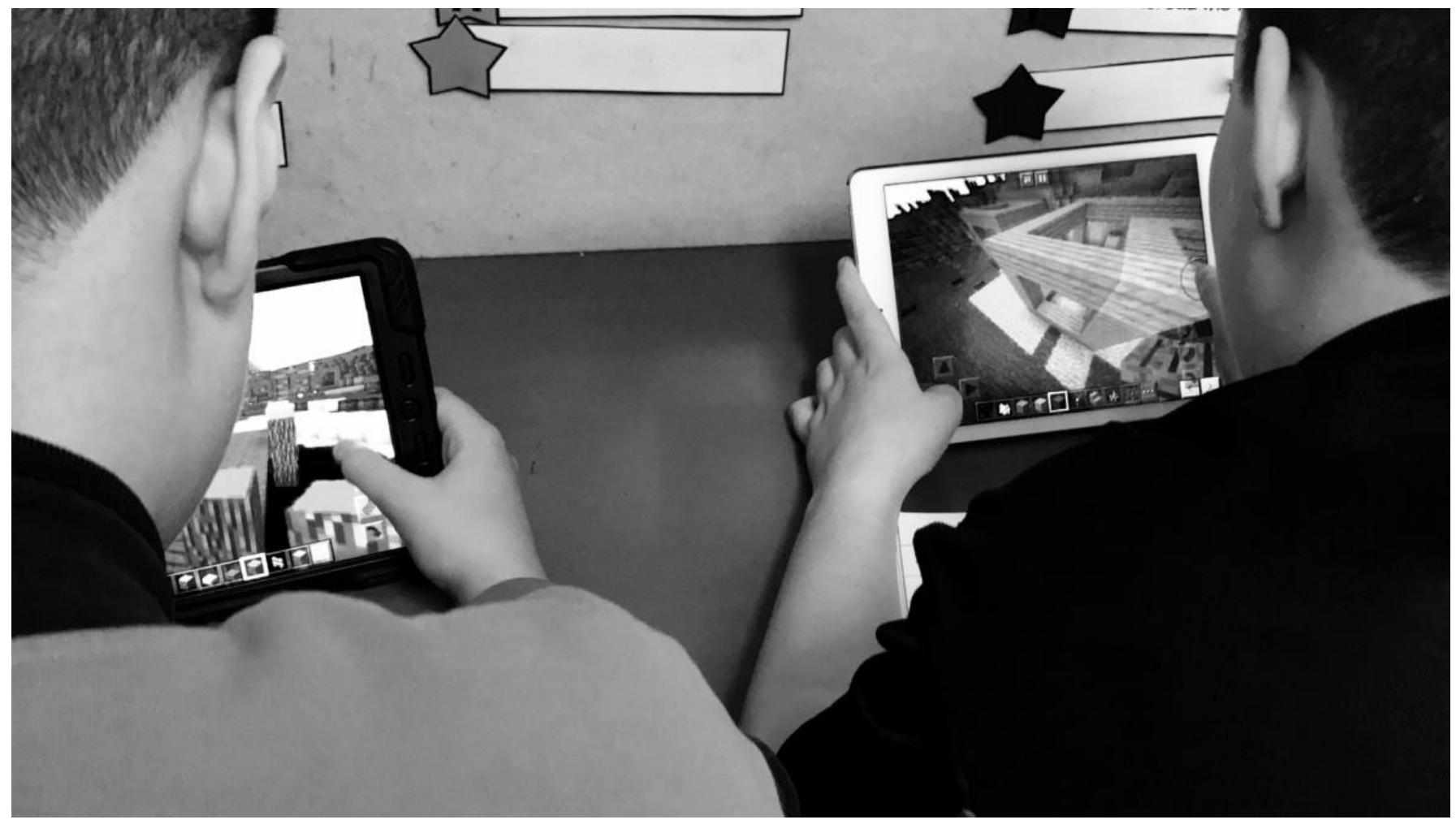 Introduction  Figure 1. Australia. Grade 5 and 6 students playing/working in Minecraft building a world—a settlement 
