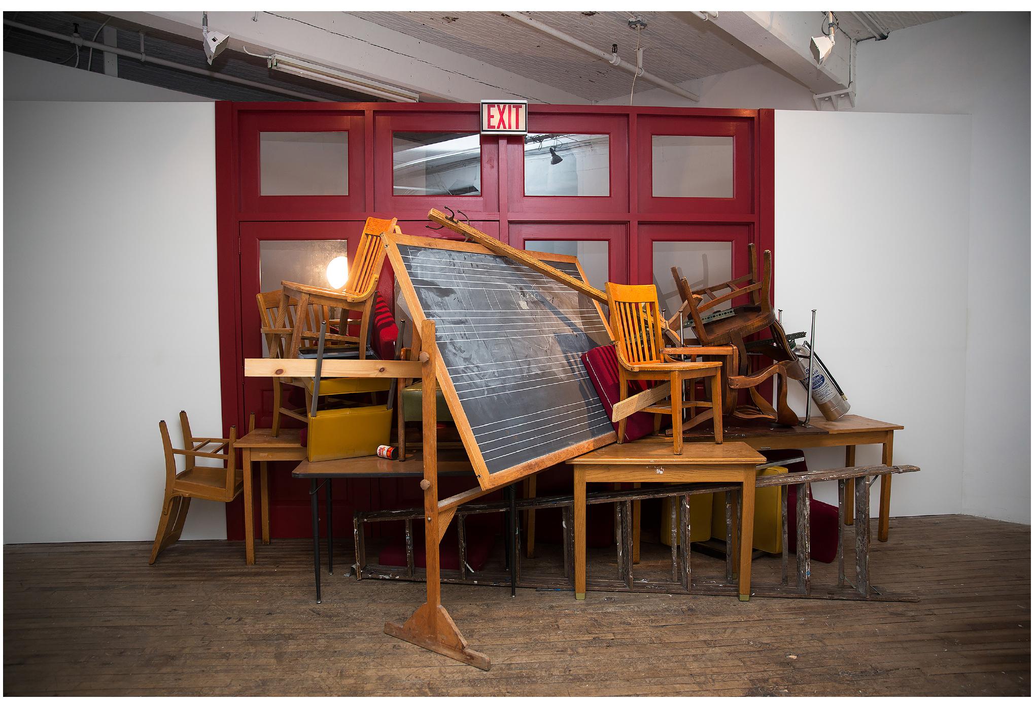 FISule & | Leal NMIOUGISIail  April 27, 1972, University of Pennsylvania (view from back) 2015. Wood, brass, drywall, furniture, lights, paint as installed at Vox Populi gallery in Philadelphia. 