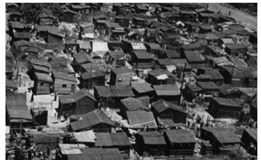 Comision Nacional de la Vivienda's work was the publication of a report on the situation of living conditions in Buenos Aires, and a plan for addressing it. The plan’s relevance, however, was more in its ramifications than in its propositions — which generally failed to prosper. That is, its relevance lay in the importance of this operation for understanding the space of the villa in the creation of a dominant  model of post-Peronist Buenos Aires.  — Tete ee na Bi ee gee cet +n > W ga 