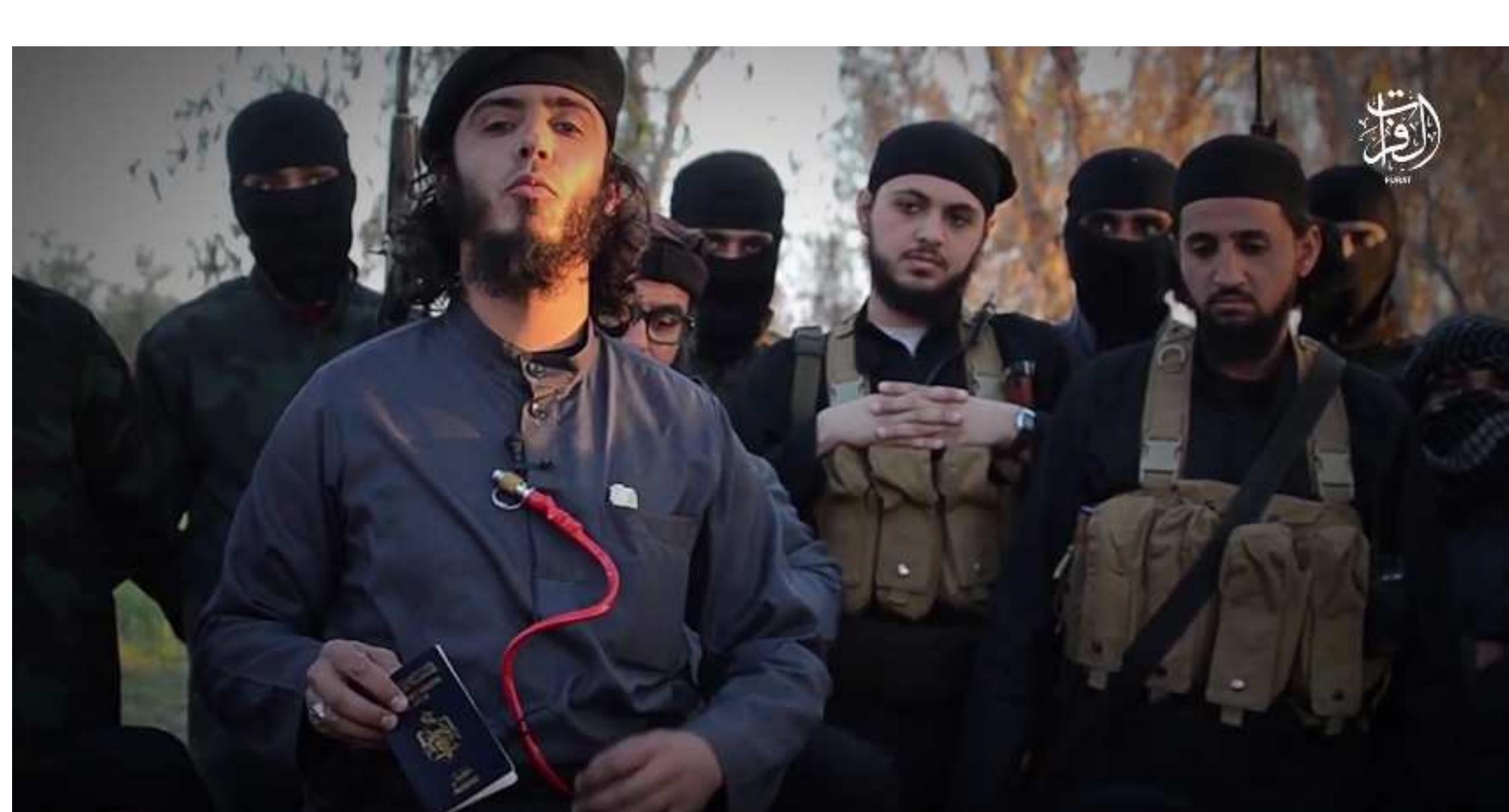 A Jordanian Islamic State fighter holds up his passport in an April 2014 Islamic State video in which fighters burned their passports. 