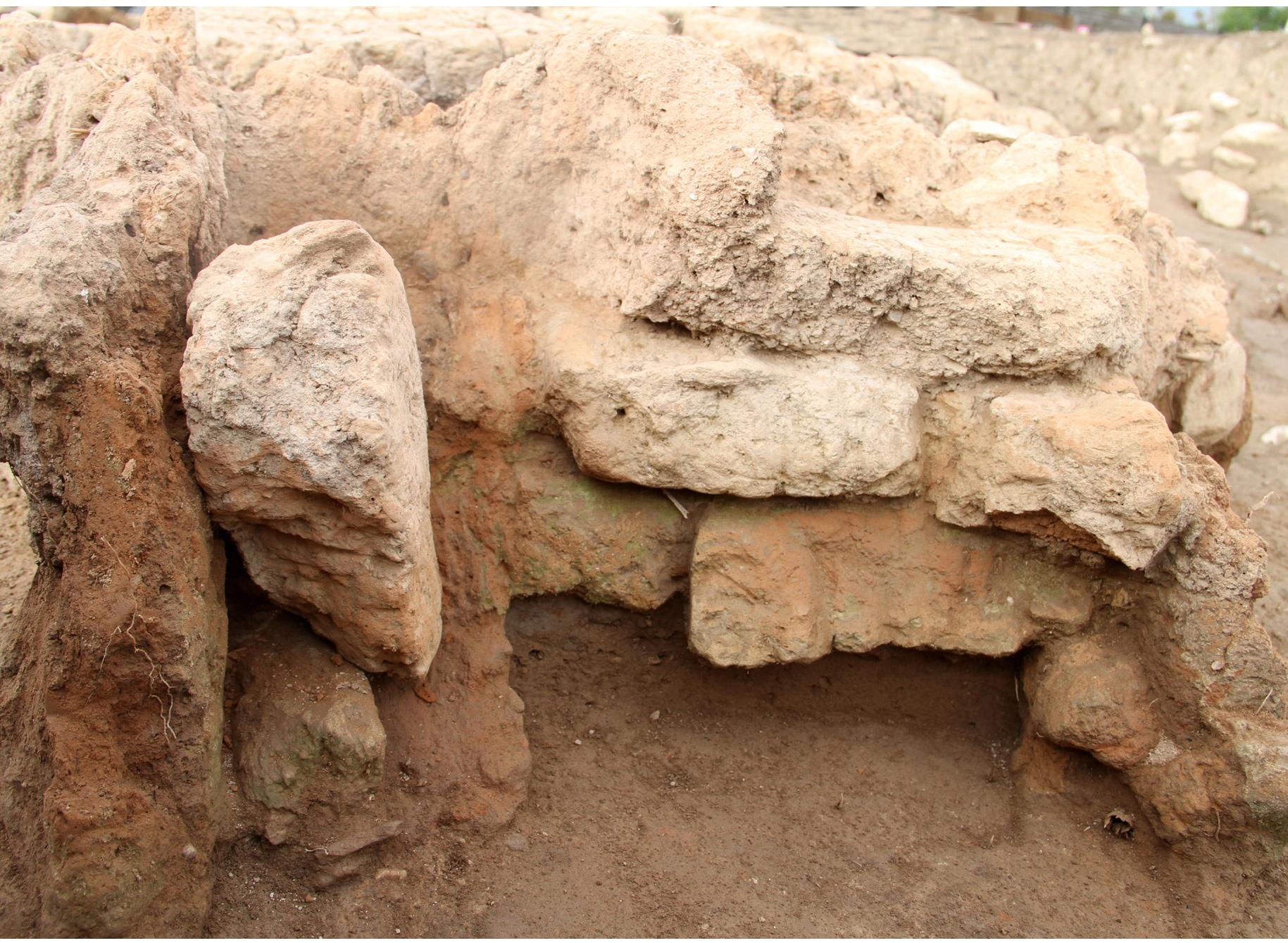 Fig. 8. The North Stoking Area of Kiln 1, as seen from the north. Four mudbricks block the stoking area.
