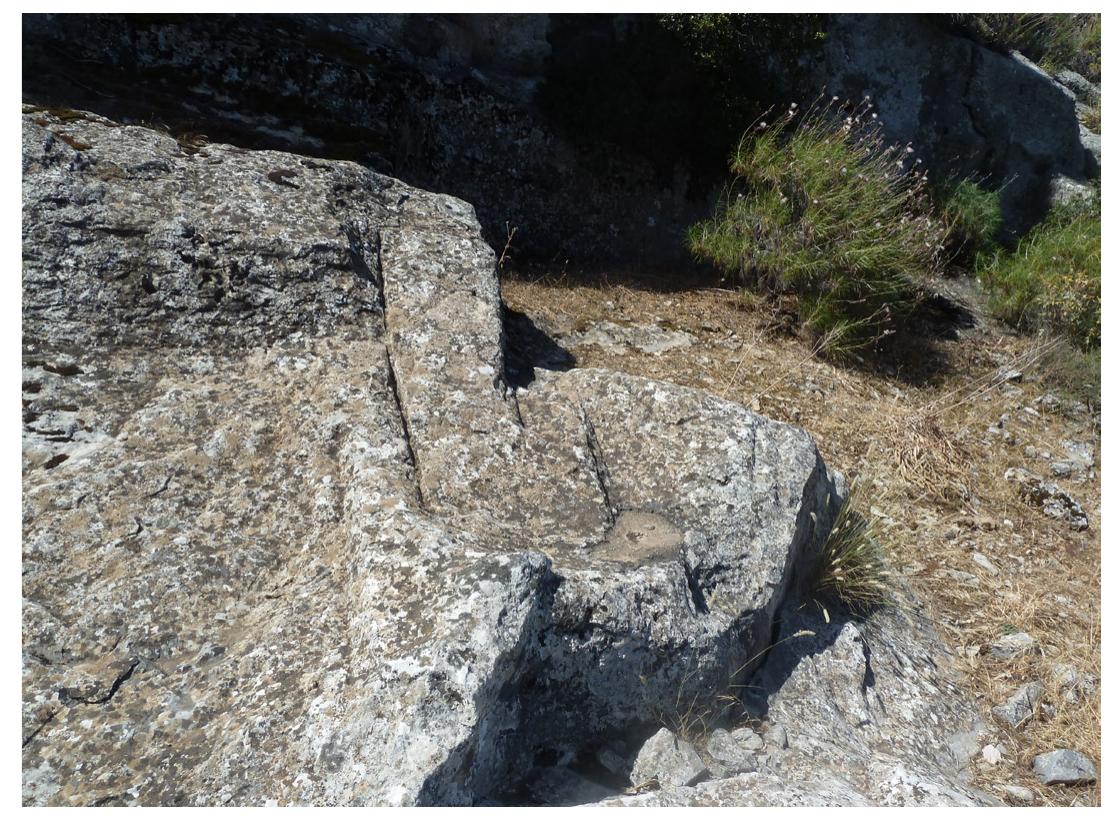 Fig. 18. A non-detached triangular block in the central part of the quarry
on the highest part of the mountain.
