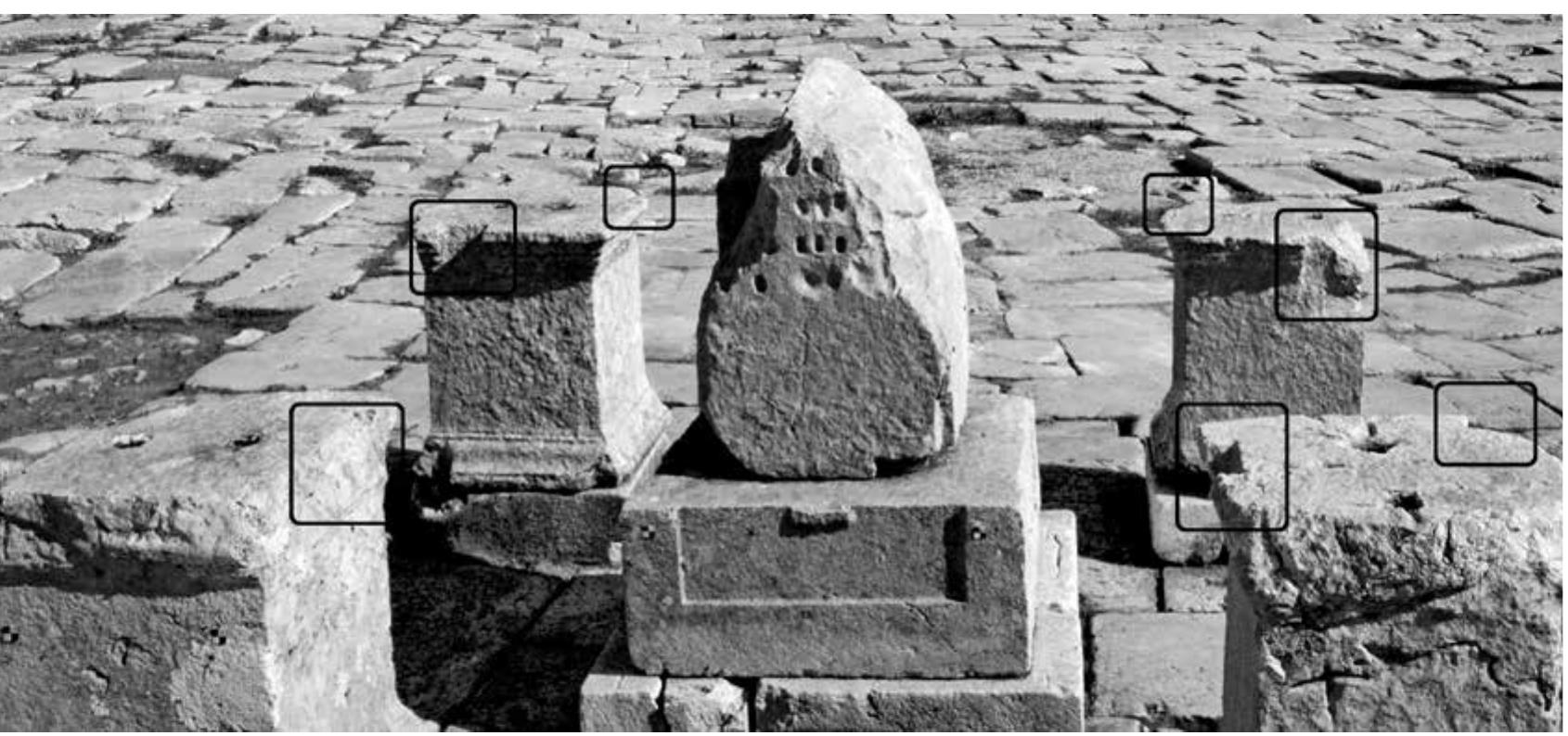 Fig. 7 Pedestals of the Tychaion with indication of the cuttings in the upper mouldings 