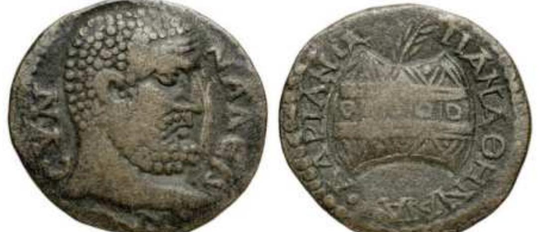 Synnada, Phrygia. AE25. Semi-autonomous issue, AD 198-276. Hadriania Panathenian Games issue. CYNNAAEQON, bearded head of Herakles right. / AAPIANA IIANAQHNAIA prize urn containing one palm branch. Mionnet IV, 983; Paris 2027; SNG Cop 718; SNG Tubingen 4197; Falghera 2976; RPC IX 886. Bibliotheque Nationale, Paris, gallica.bnf. fr. 