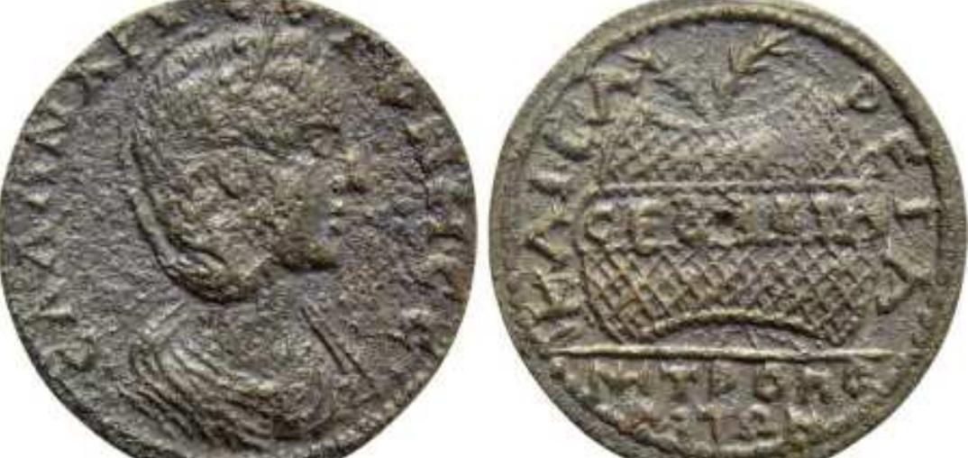 a  Salonina, AE28 of Metropolis, lonia. AD 254-268. CAAQN XPYCOTONH CE, draped bust right, wearing stephane. / KAICAPEIA around, MHTPOIIO-AITON in two lines below, prize urn containing two palm branches and inscribed CEBACTA. SNG Tuebingen 2986. Numismatik Naumann auction 58, Lot 302, Oct 2017.  KAIZAPEIA: The Caesarean Games were held in many cities, either in conjuction with the Actian or Pythian or Isthmian Games, or in the years between these major events. Because so many towns used "KAISAREIA" as part of their city name, often only temporarily, on their coins, it is often difficult to tell which ones refer to any Caesarean games held in their town. Metropolis, lonia held Caesarean games in conjunction with the "Sebastian" Games as shown on coins struck by the family of Philip | (AD 244-249) and the Valerians (AD 253-269). 